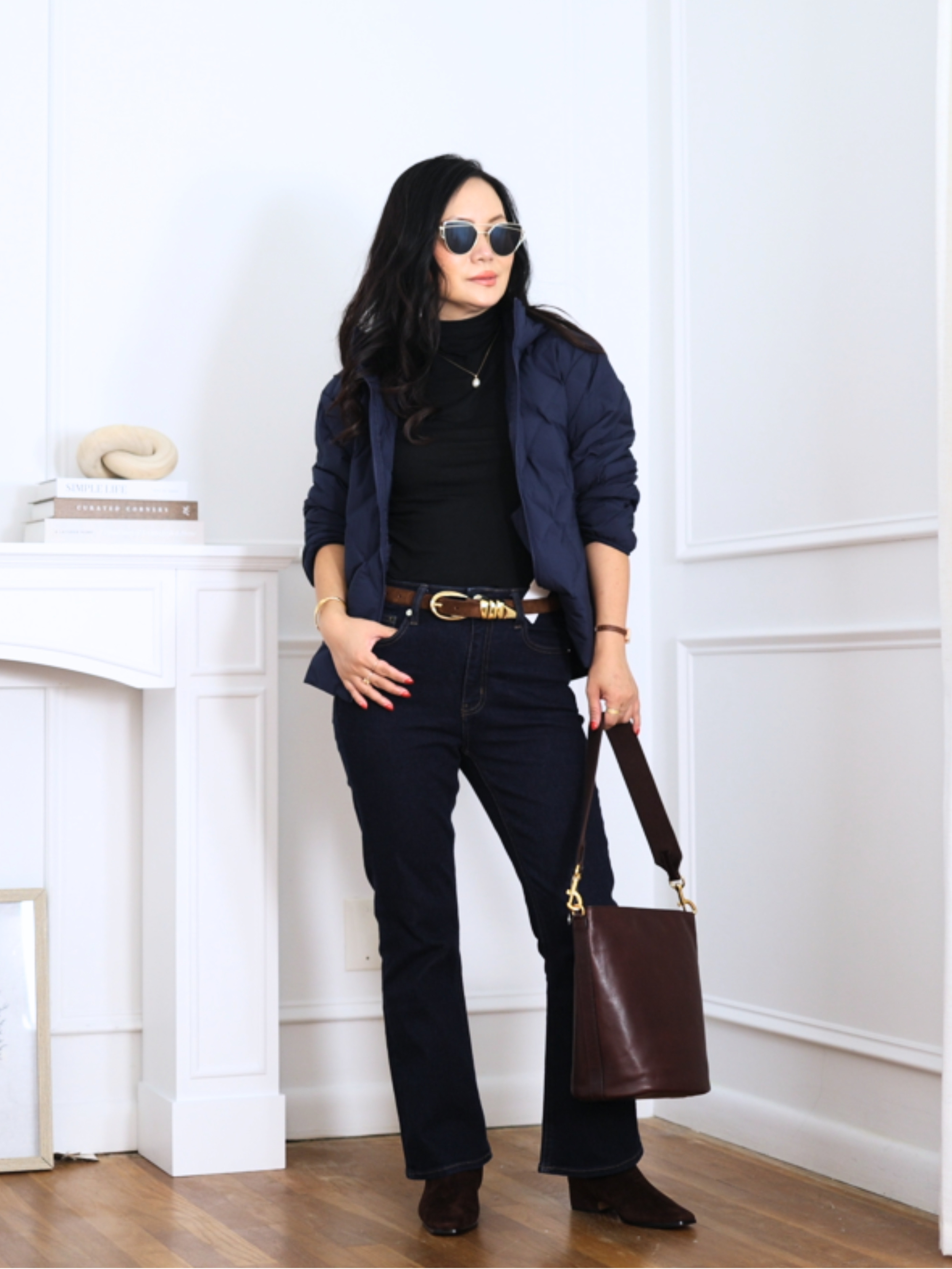 This UNIQLO jacket has been one of my favorite finds lately. The shorter length is SO good if you’re petite like me. I’m wearing size XS. Wearing with Quince bella kicklare jeans. 

 #LTKSeasonal #LTKOver40 #LTKPetite