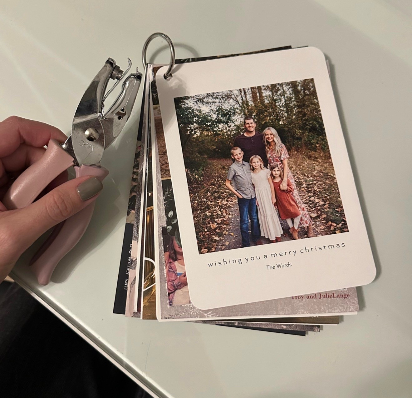 Easily organize the Christmas cards that you receive from friends and loved ones! Just use a hole punch and a key ring to make a little keepsake that you can look back on past years  

#LTKFindsUnder50 #LTKHoliday #LTKSeasonal