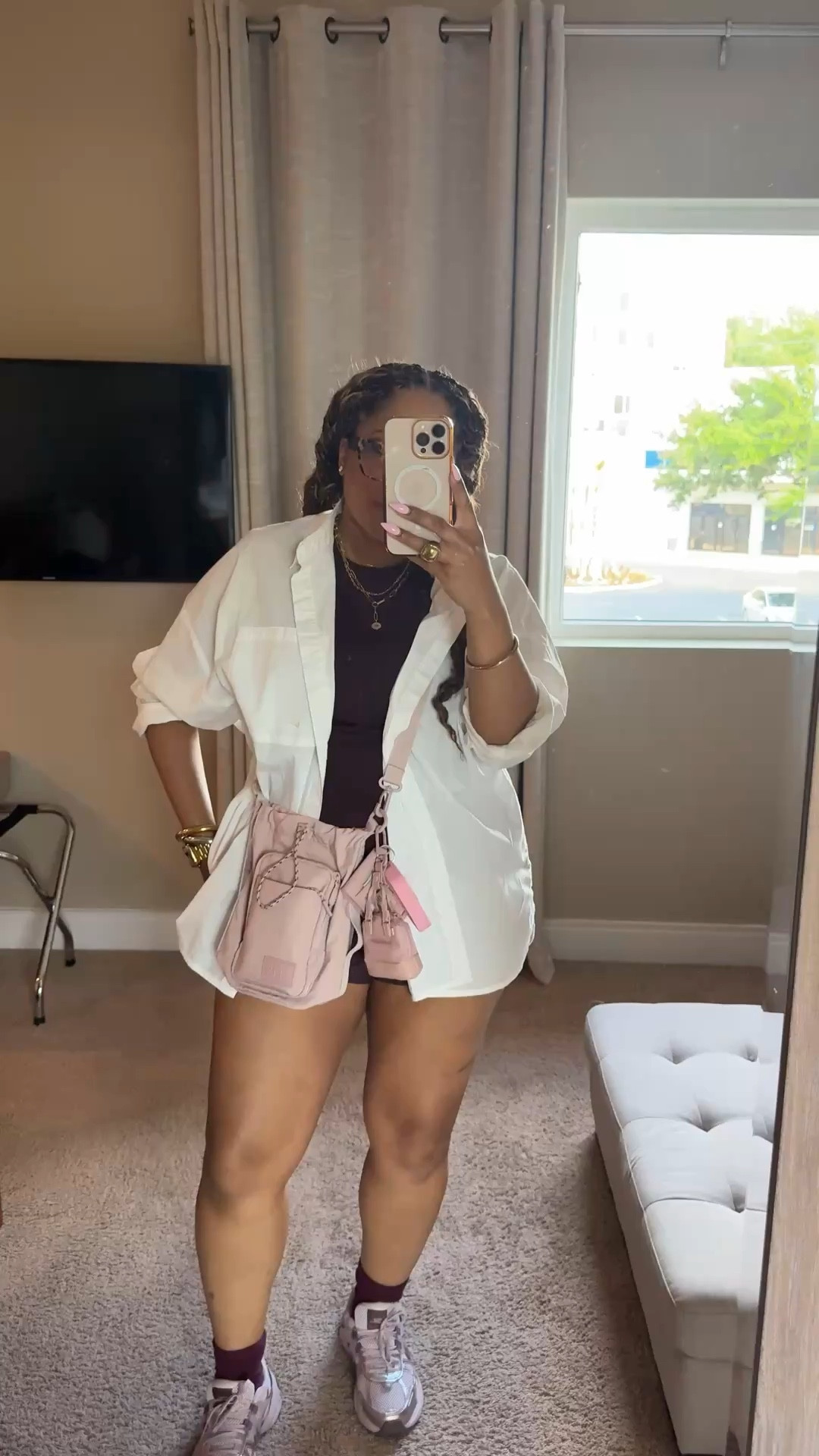 Easy theme park/ summer break outfits for moms. My exact color in the shorts maybe sold out but sneakers also match with the mushroom mauve color @Fabletics 
Sneakers @Nike US my water bottle bag is from @beistravel and fit all my essentials ☺️

#LTKmomlife #LTKootd #LTKdayinmylife