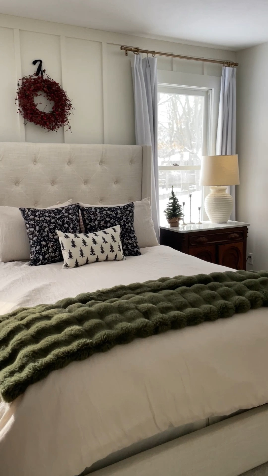 Christmas master bedroom details including my flocked Queen tree from King of Christmas.  

Upholstered bed frame.  Christmas pillow.  Quince bedding.  Gingham sheets.  Green faux throw.  Walmart finds.  White pinch pleat curtains.  

#LTKHome #LTKHoliday #LTKSeasonal