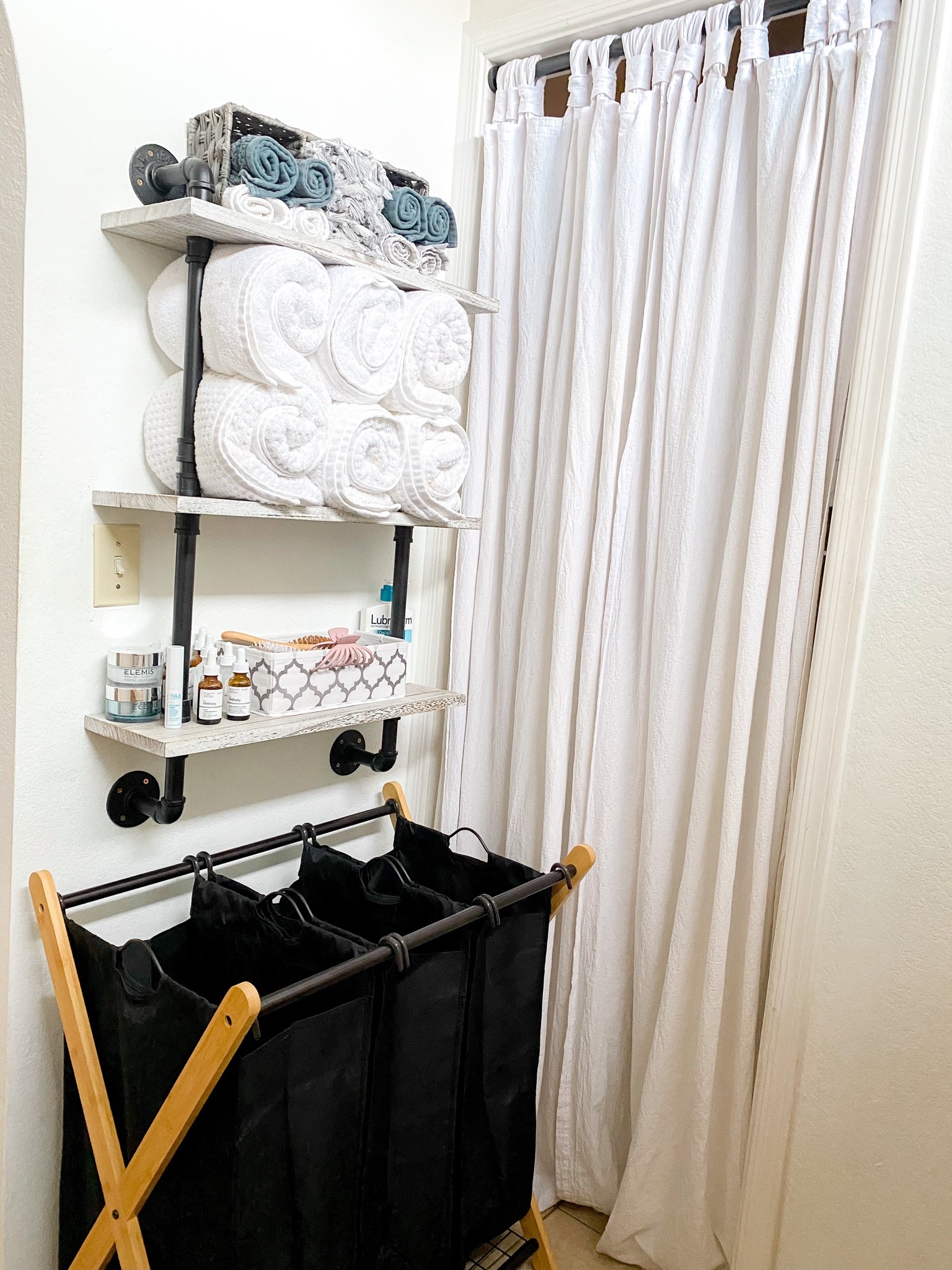 New laundry basket; really wanted something that would make sorting a little more easy when the end of the week comes. This one is such high quality, I was very satisfied with our purchase. It is to big for our space here, but I’ll tolerate it sense I love it so much. 
Wall shelf has been holding up very well also, going on four months. Highly recommend the towel sets and that towel warmer as well, I love that thing. Linked up some extras, such as our linen curtains (they no longer have white) and that adjustable curtain rod is the best I’ve tried out so far! 

#founditonamazon #amazonfinds #bathroom #smallspace 

#LTKhome #LTKHoliday #LTKSeasonal