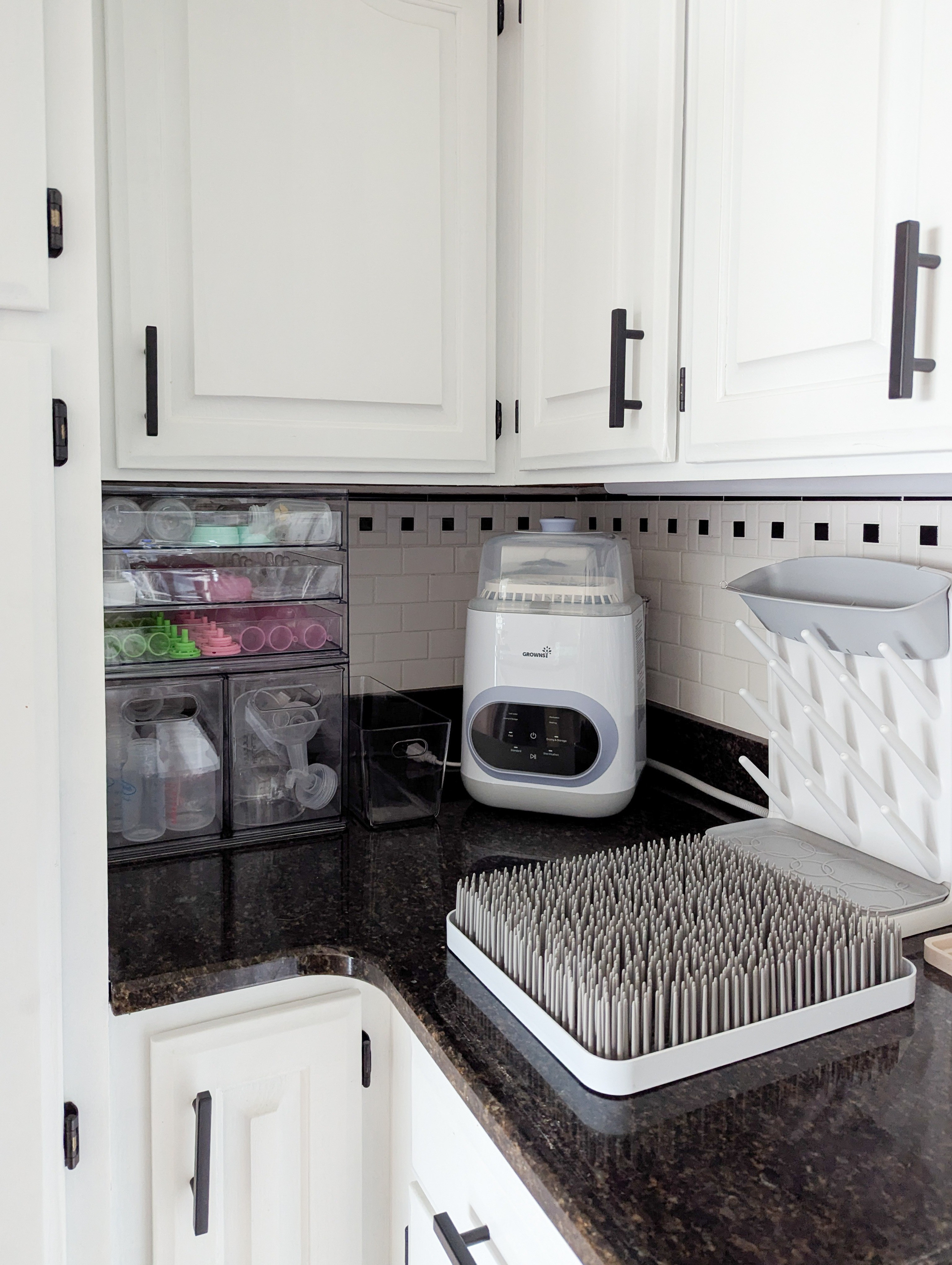 Everything we used to set up our bottle washing & organizing station! Stackable clear storage bins, easy-to-clean drying racks, an affordable bottle washing & sterilizing machine & all of the little accessories to make this space functional. #babyessentials #bottlewashing #organization #kitchenorganization #babyorganization #kitchenessentials 

#LTKHome #LTKBaby #LTKFamily