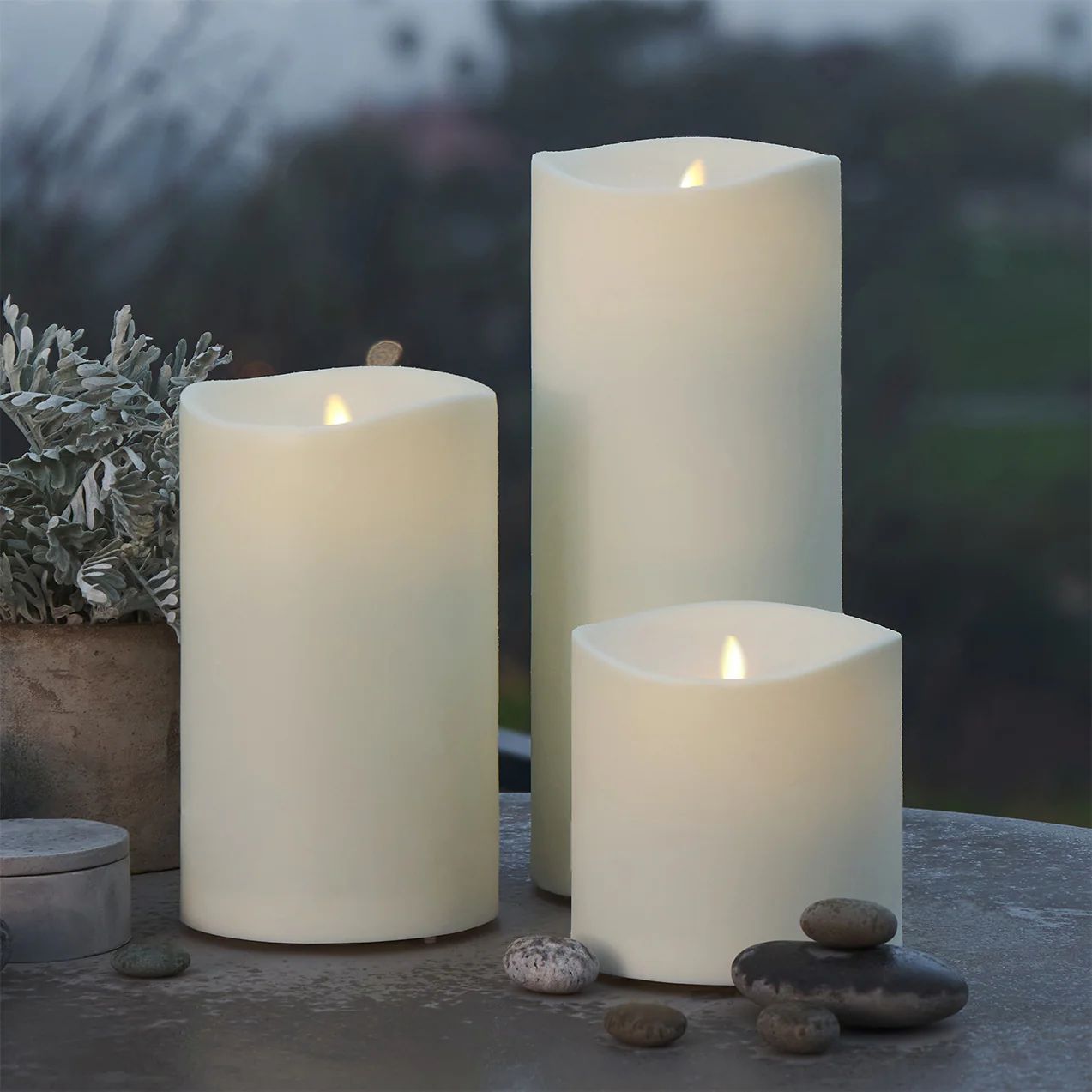 Pearl Ivory Outdoor Flameless Candle Grand Pillar with Remote - Melted Top | Luminara