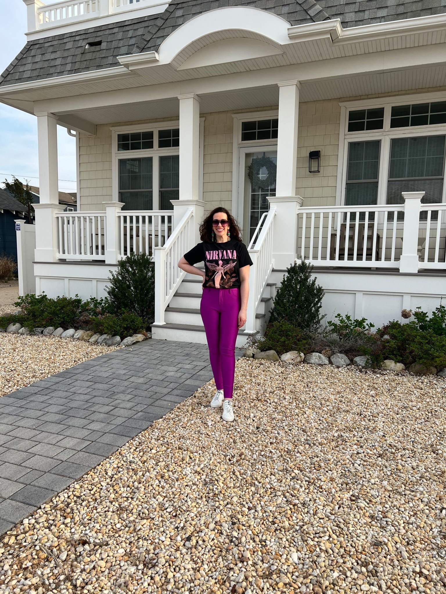 Black graphic t-shirt (s). High shine compression pink leggings (s). Studded sneakers (8.5). #tshirt #blacktshirt #nirvanatshirt #leggings #compressionleggings #pinkleggings #highshineleggings #studdedsneakers #sneakers #springoutfit #whitesneakers 
spring outfits 2026 

#LTKSeasonal #LTKootd