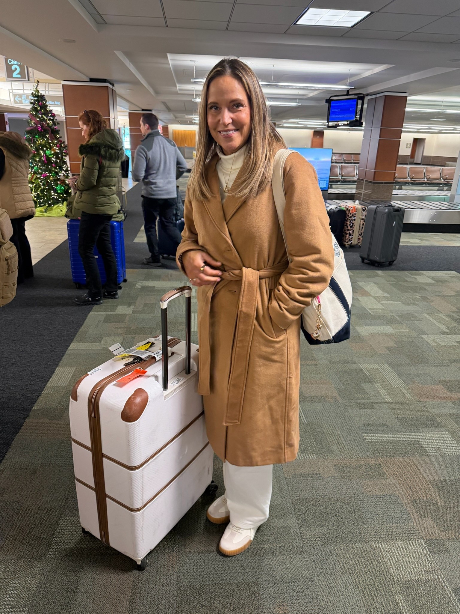 Travel days call for outfits that feel good and look pulled together, and this Lands’ End set checks every box. I’ve been reaching for this wool wrap coat nonstop, it layers beautifully and adds the perfect finishing touch. The long sleeve high-neck top has quickly become a winter staple I wear on repeat.

#LTKMidsize #LTKSeasonal #LTKOver40