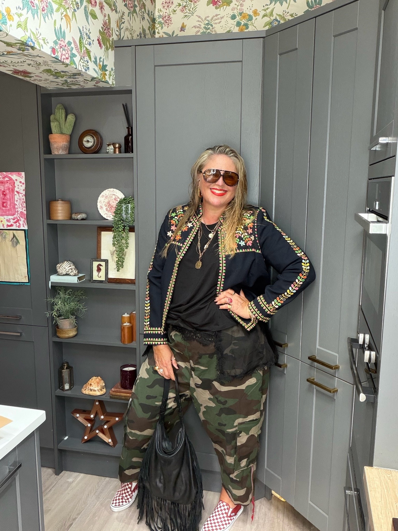 Camo trousers, black trashier, patterned jacket, black sunglasses, checkerboard vans, fringed bag

#LTKautumn #LTKplussize #LTKstyletip