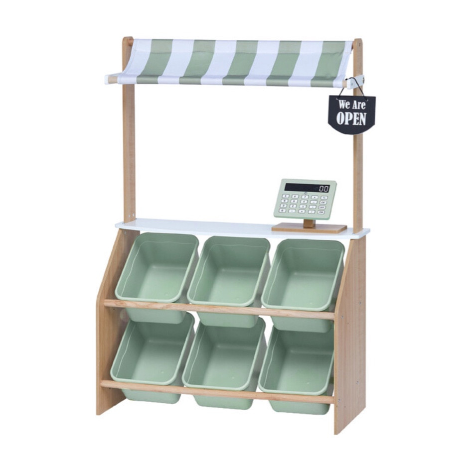 Market play stand with bins in olive green 💚

Your little one can now engage in constructive and creative play where they imagine themselves as a shopkeeper or browsing fresh produce to bring home! Let them practice counting skills, new vocabulary, navigating interpersonal conflicts, & so much more in a safe, fun environment! Includes 6 plastic storage bins, a cash register tablet, & reversible sign for a more complete play experience.

#LTKBaby #LTKFamily #LTKKids