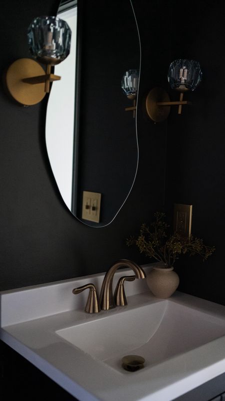 Powder room reveal! I linked what I could 🤍🤍

Bathroom makeover, powder room, wall sconce, mirror, faucet 

#LTKhome