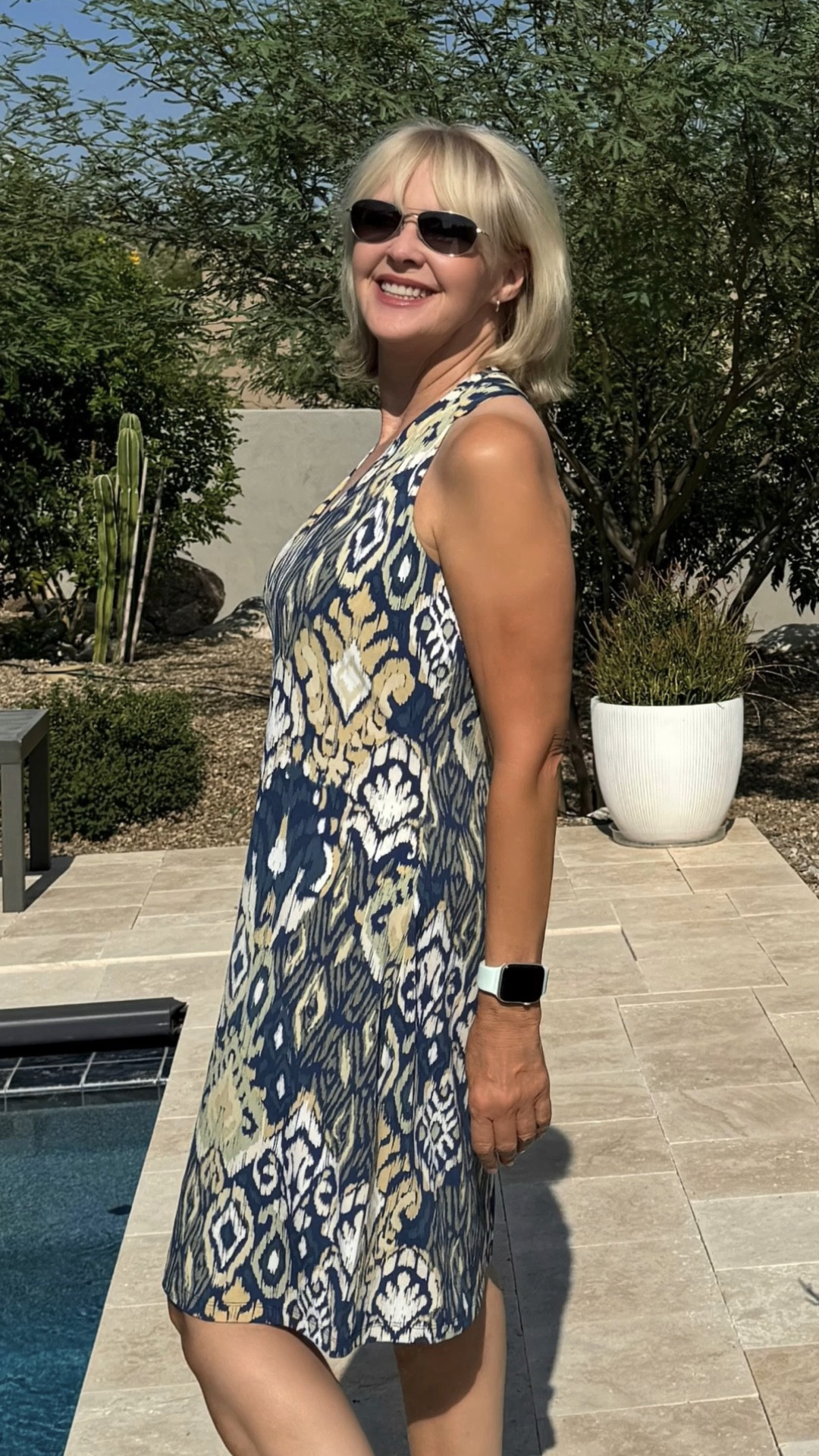 This lovely, halter-neck dress has a hint of stretch for comfort, UVB 30 sun protection, and is wrinkle-resistant! 

#LTKSeasonal