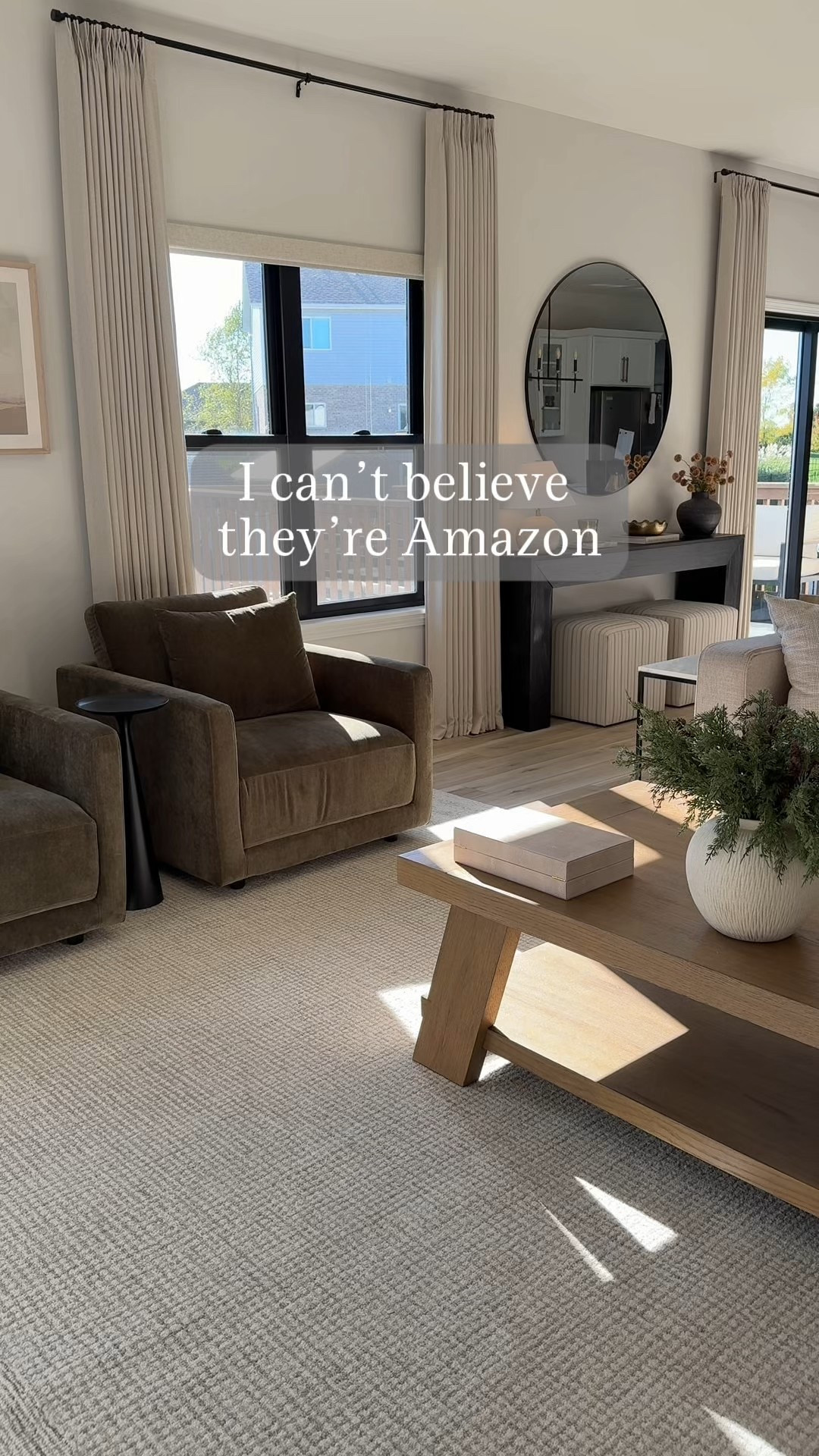 Amazon pinch pleat curtains! 
Helpful Info:
- I have the Natural Birch color
- For width I'd recommend going at least 2 sizes wider than your window. I have one set of 2 - 40 inch wide panels (160 inches total) on each side of my windows and they are 60 inches wide.
- Also, hang your curtains closer to the ceiling for a more elevated look! I have 9ft ceilings and my curtain rod is about 5 inches from the ceiling (I have the 104 inch length curtains). The plastics hooks that come with the curtains allow you to adjust them up and down to get the perfect fit.

#LTKHome