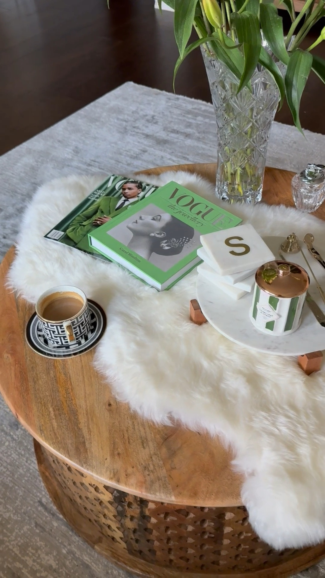 My coffee table decor is always changing. Here’s what it currently is. Enjoying my new Vogue Jewelry coffee table book, celery leaf & citrus candle,  & long stem lily’s (Mother’s Day gifts from my daughter). The candle smells devine! It’s creamy, citrusy & sweet.

#LTKFindsUnder100 #LTKSeasonal #LTKHome