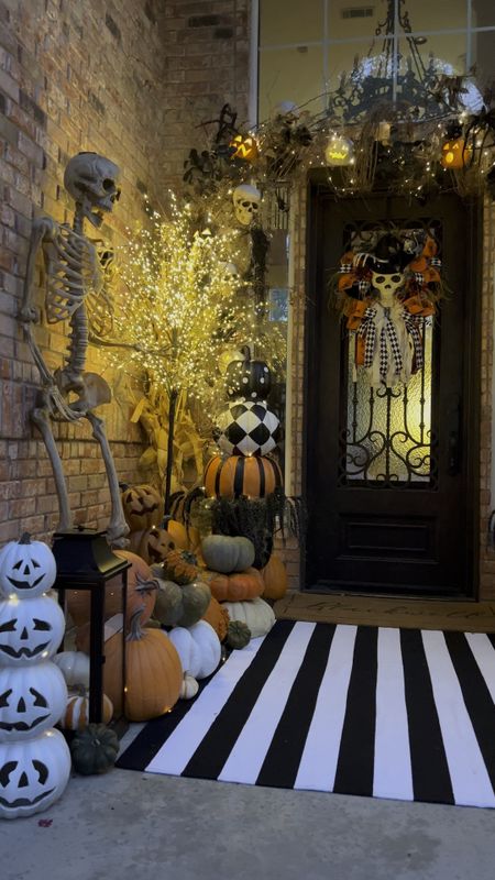 Our Halloween porch! Halloween decor. Halloween home. Skeleton. Pumpkin topiary 

#LTKhome #LTKSeasonal #LTKHalloween
