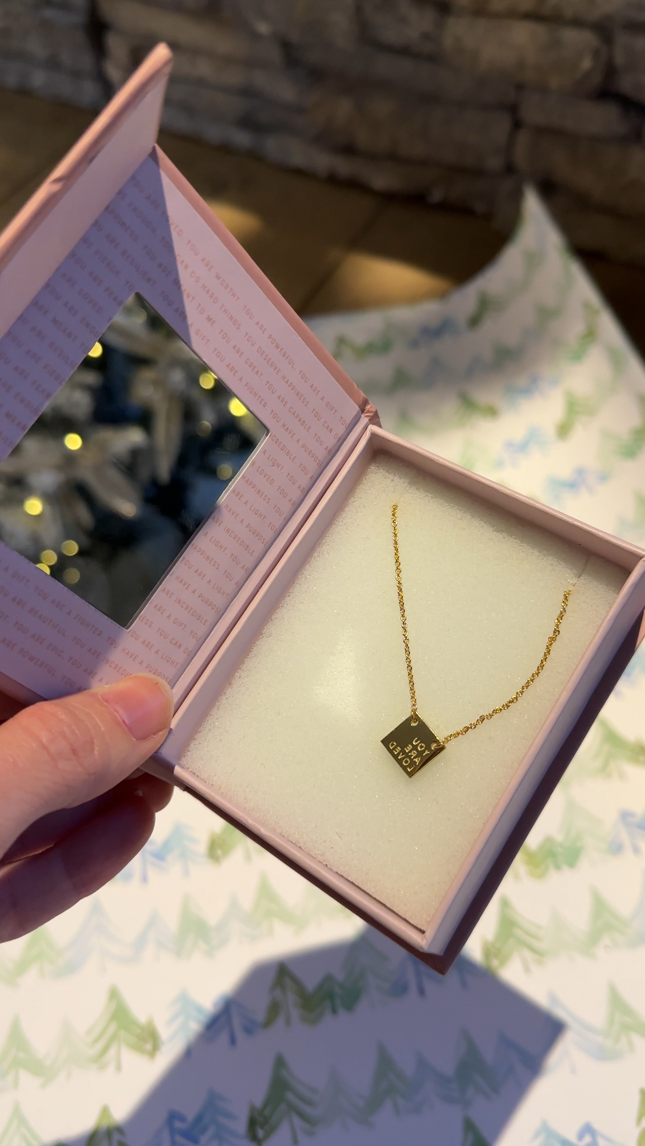 Gift idea for her! ✨🎁 love this dainty gold necklace with a “you are loved” message inscribed backwards so it reads correctly & you are reminded of your worth when looking in the mirror. 🥰 also love supporting this mother daughter run small business. 👏🏼 Linked some other options below. 

#LTKHoliday #LTKVideo #LTKGiftGuide
