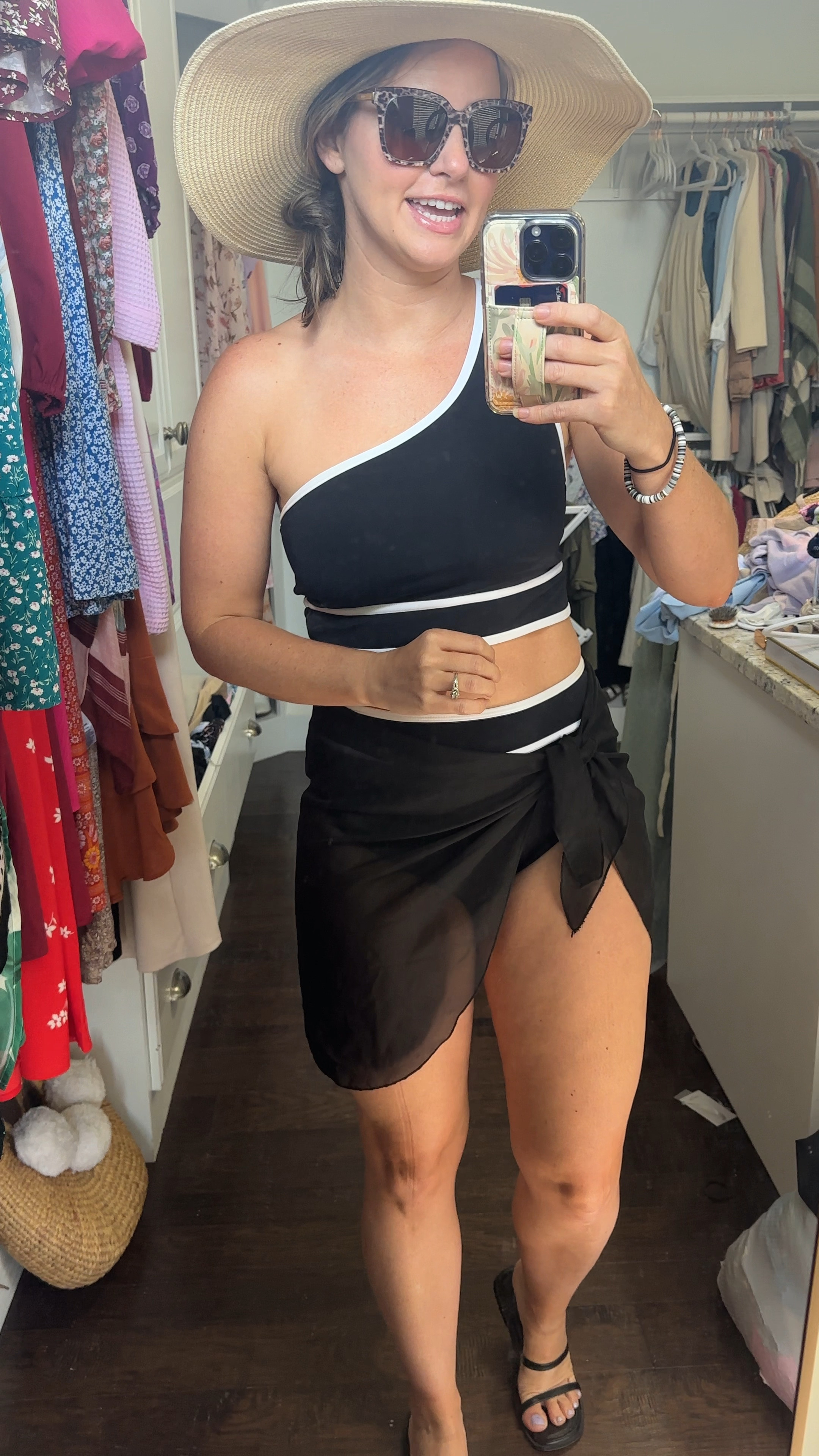 Amazon swimsuit and coverup I’m loving!! One shoulder black and white two piece, high waisted bottoms & great coverage. Wearing size M. It comes as a set— Top is a tiny bit big but not that noticeable & I didn’t want to do a size smaller bc I would have had to get a small in the bottoms which wouldn’t have worked on my body! Definitely a true m in bottoms. 

Mom swimsuit, mom friendly, bathing suit suit, sarong coverup, beach outfit, resort wear, full coverage swimsuit, Amazon fashion, Amazon finds 

#LTKSummerSales #LTKTravel #LTKSwim