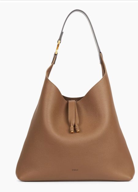 Why am I such a sucker for a good hobo bag?! I haven’t seen this one in person yet. I’m almost afraid to because I know what is going to happen if  I do.
Hobo bag, Chloe, Chloe Bag, designer bag 

#LTKSeasonal #LTKworkwear #LTKitbag