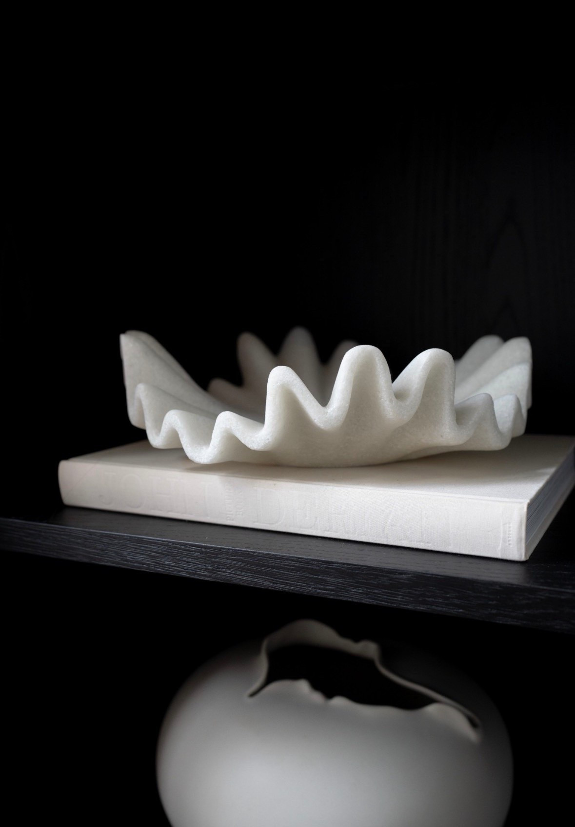 Look at this bowl (and the vase and the book)! These pieces add movement and drama to any space.



#LTKHome #LTKSeasonal #LTKdayinmylife