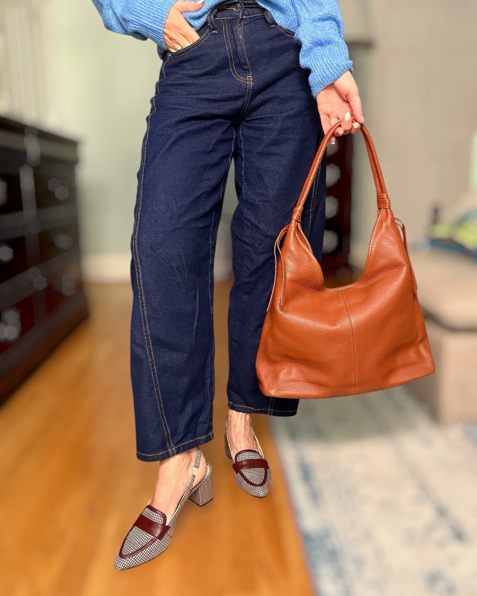 Blue Cardigan & Dark Denim Fall Outfit 💙🤎

This outfit is giving classic fall with a fresh pop of color! 💙 The soft blue cardigan pairs perfectly with dark barrel-leg jeans, timeless slingback heels, and my favorite genuine leather cognac tote that’s only $60. Add a printed headband and simple gold jewelry for an effortlessly polished look that’s perfect for work, lunch, or weekend plans. These are the kind of versatile pieces you’ll wear on repeat all season long! 🍂✨

Fall outfit inspiration, blue cardigan outfit, dark wash barrel jeans, genuine leather tote, $60 leather handbag, cognac purse, slingback heels, classic fall style, elevated casual outfit, women’s fall fashion, timeless wardrobe staples, Amazon fashion finds, workwear outfit, preppy style, chic everyday look.

#LTKOver40 #LTKPetite #LTKWorkwear