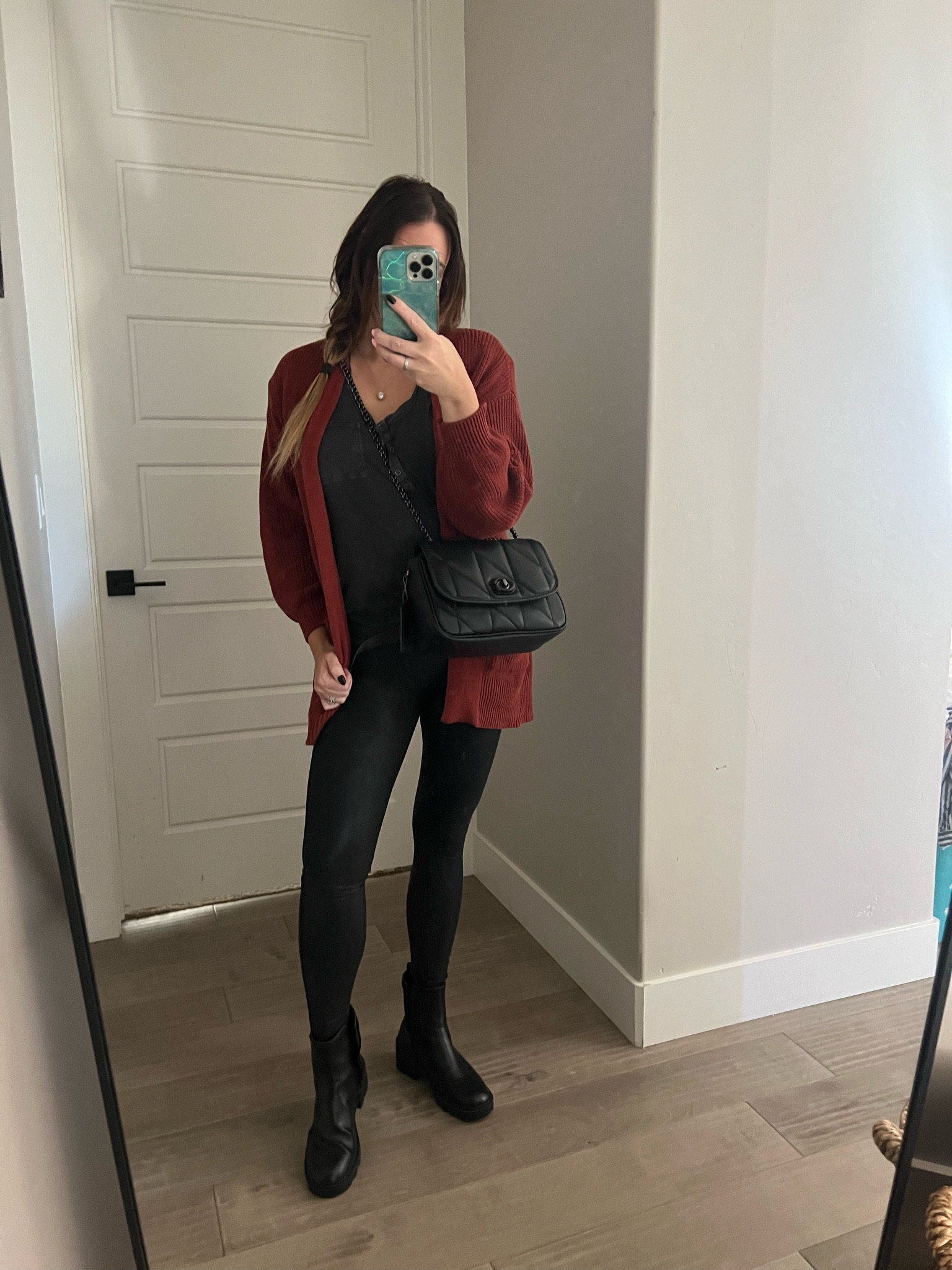 🍂✨Another fall date night outfit Inspo ! 
Mark moody and comfy. 

1. Black faux leather leggings 
2.Black bodysuit, oversized boyfriend t-shirt or oversized graphic tee 
3.Oversized rust or caramel colored cardigan or duster. 
4. Slip on black Chelsea boots, combat boots or checkered vans. 
5. Pair with a quilted crossbody bag in black or tan. 
6. Messy side braid (you don’t want to look like you tried too hard ;) make him work for it). 

Modest but sexy too. 

My leggings are Spanx (I also own Commando which are another fav brand and worth the splurge ) 
My top is Aerie 
My Sweater is Target
My Boots are -gasp- Walmart
Bag is Coach. 
Earrings are Amazon Fashion 

#LTKover40 #LTKmidsize #LTKstyletip