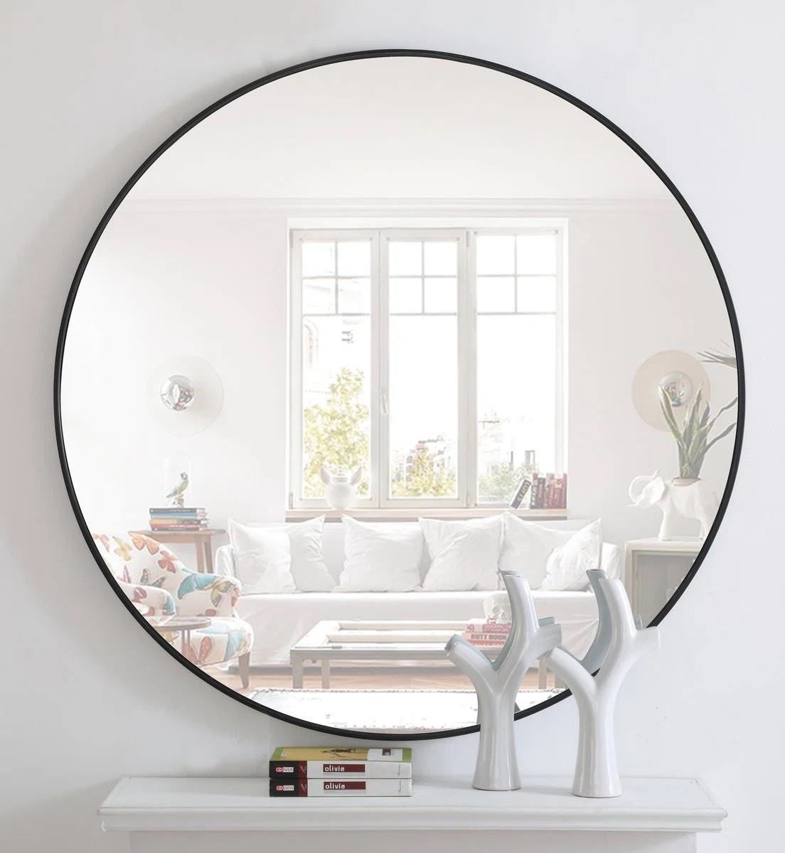 This Sabine round wall mirror by RE/FINE is such a timeless piece for any space. The oversized circular design and sleek black metal frame instantly brighten a room while adding that clean, modern touch. Perfect above a console table, vanity, or in a living room to reflect light and open up the space. 

Tax Refund Sale Wayfair 

#LTKHome #LTKSaleAlert