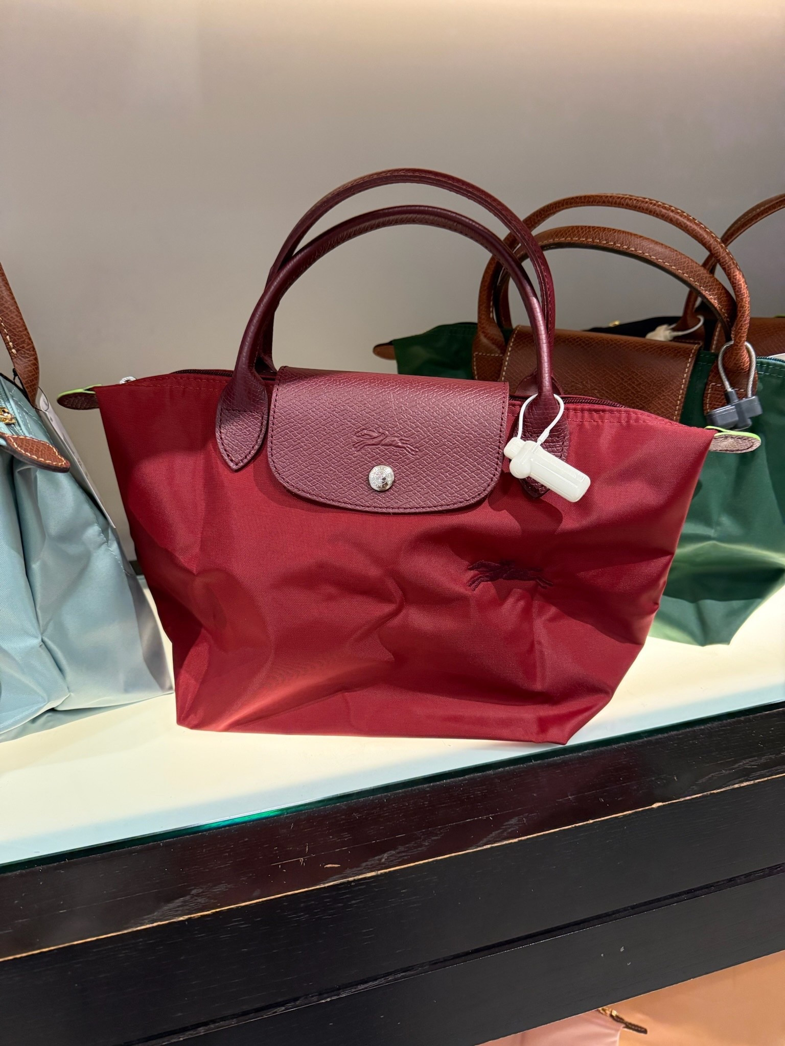 I saw this cutie at Nordstrom and it stopped me in my tracks! I've been wanting a casual everyday red or burgundy handbag and this one is adorable! I like that's it's kind of in between both colors so it can go with more outfits. I love Longchamp bags since they are heavy duty and lightweight. I linked it and a different size too!⬆️

#Itkcreator #Itkfinds
#Itkwatchnow #handbag #nordstrom #burgundy #fall #fallfashion #longchamp

#LTKootd #LTKHoliday #LTKSeasonal