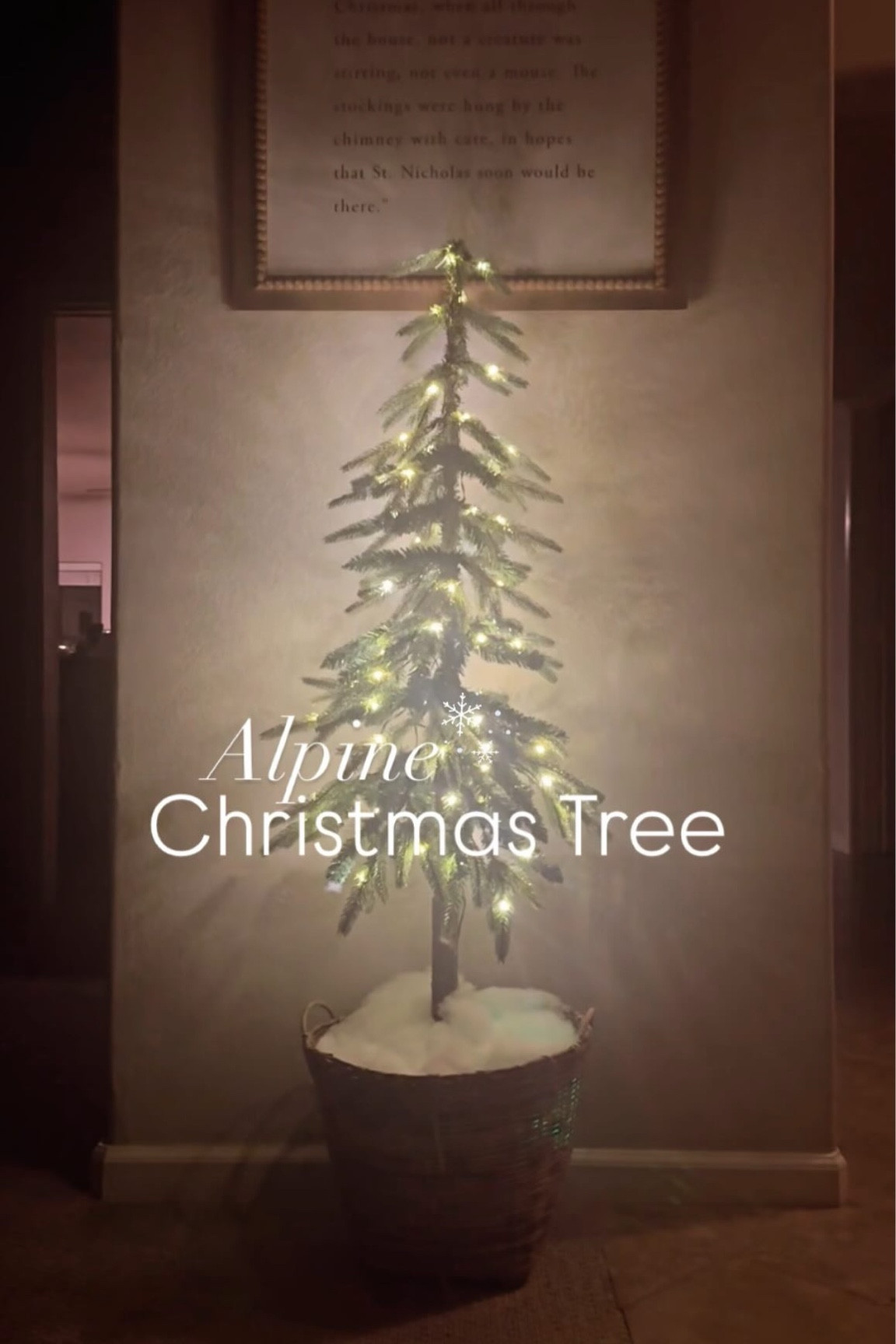 Alpine Christmas tree 🎄 christmas sparkle is spreading through our home, and one of my favourite additions is the downward swept alpine from @target we added the basket, some faux snow and stayed with our Night before Christmas script for a little extra Christmas magic ✨ ⁣
⁣
I totally forgot we didn’t have a power outlet in the entry so added the power bank from which has been a Christmas tree life saver 🎄 ⁣
⁣⁣
Its pre-lit and comes in multiple sizes (4,5 and 6ft)  and is so festive 🎄best of all, its 30% off 🛒 link in stories & LTK⁣⁣
⁣⁣
#targetchristmas #alpinechristmasmarkets #christmastree #christmasdecor #christmasdecorating #christmasaesthetic #happyholidays #seasonaldecor #christmaslights #christmas #christmasinspiration #christmasinspo #decorateforchristmas