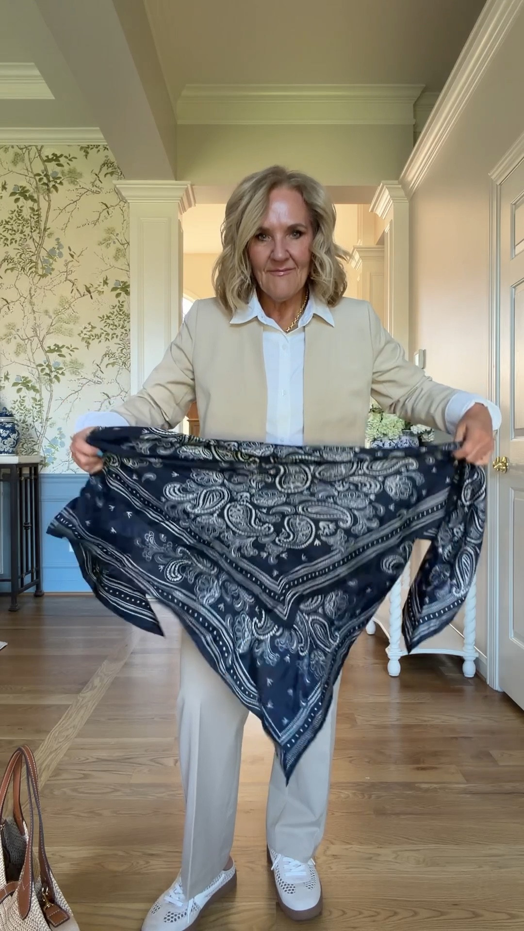 How to wear an oversized silk bandana 2 ways. Just remember the square knot, right over left, left over right. 
Tie it in or bag, or wear it over your blazer 
Blazer size 10 petite 
Blouse size small
Pants size 8 for a relaxed fit 
10% off code NANETTE on my bag 
20% off code NANETTE20 on my bracelets 

#LTKOver40 #LTKWorkwear #LTKSaleAlert