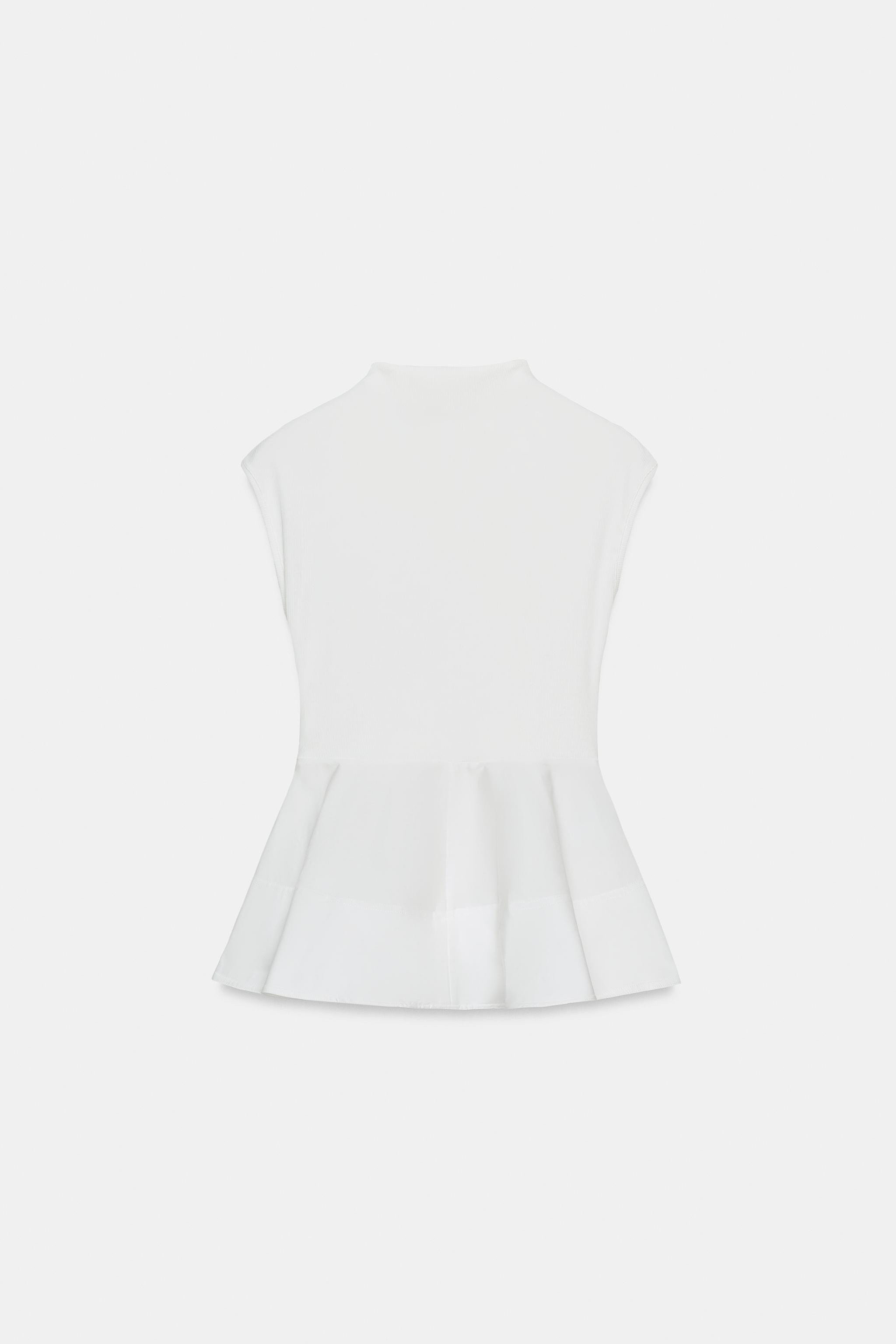 Top made of cotton blend yarn. Perkins collar and sleeveless. Tonal peplum hem. | Zara US
