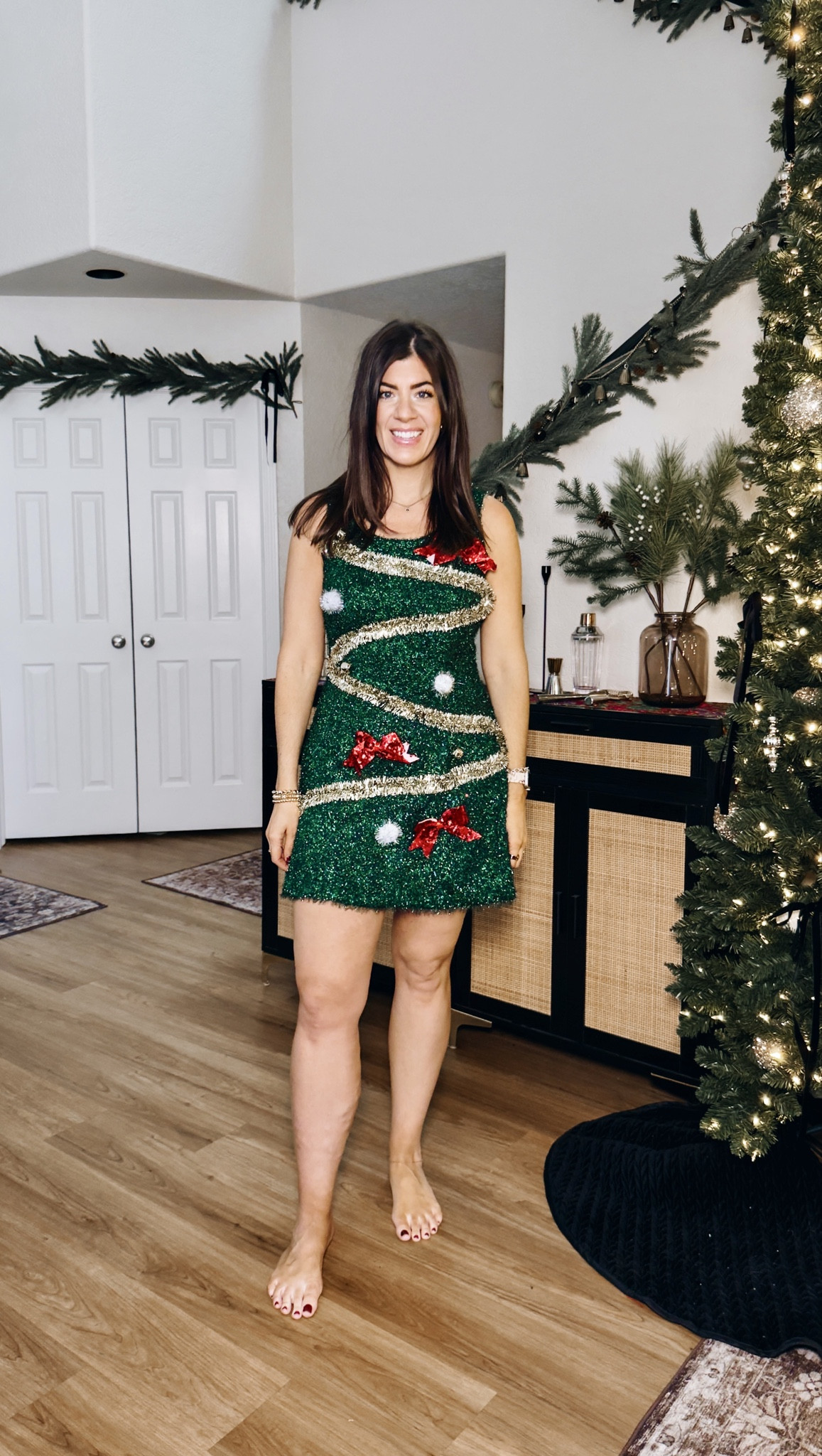 In a large ugly sweater dress 

#LTKHoliday #LTKFindsUnder50 #LTKMidsize