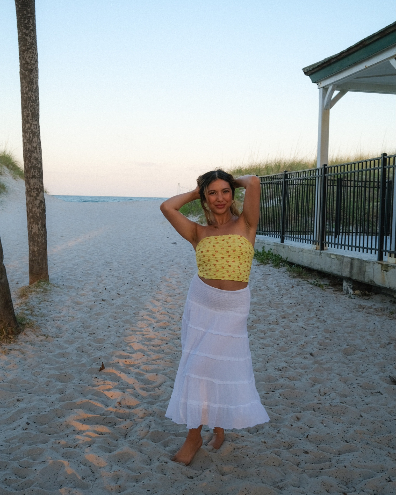 The perfect beach vacation outfit! Yellow floral y2k style floral print ruffled tube top and a white tired maxi skirt



#LTKSeasonal #LTKswim #LTKunder50