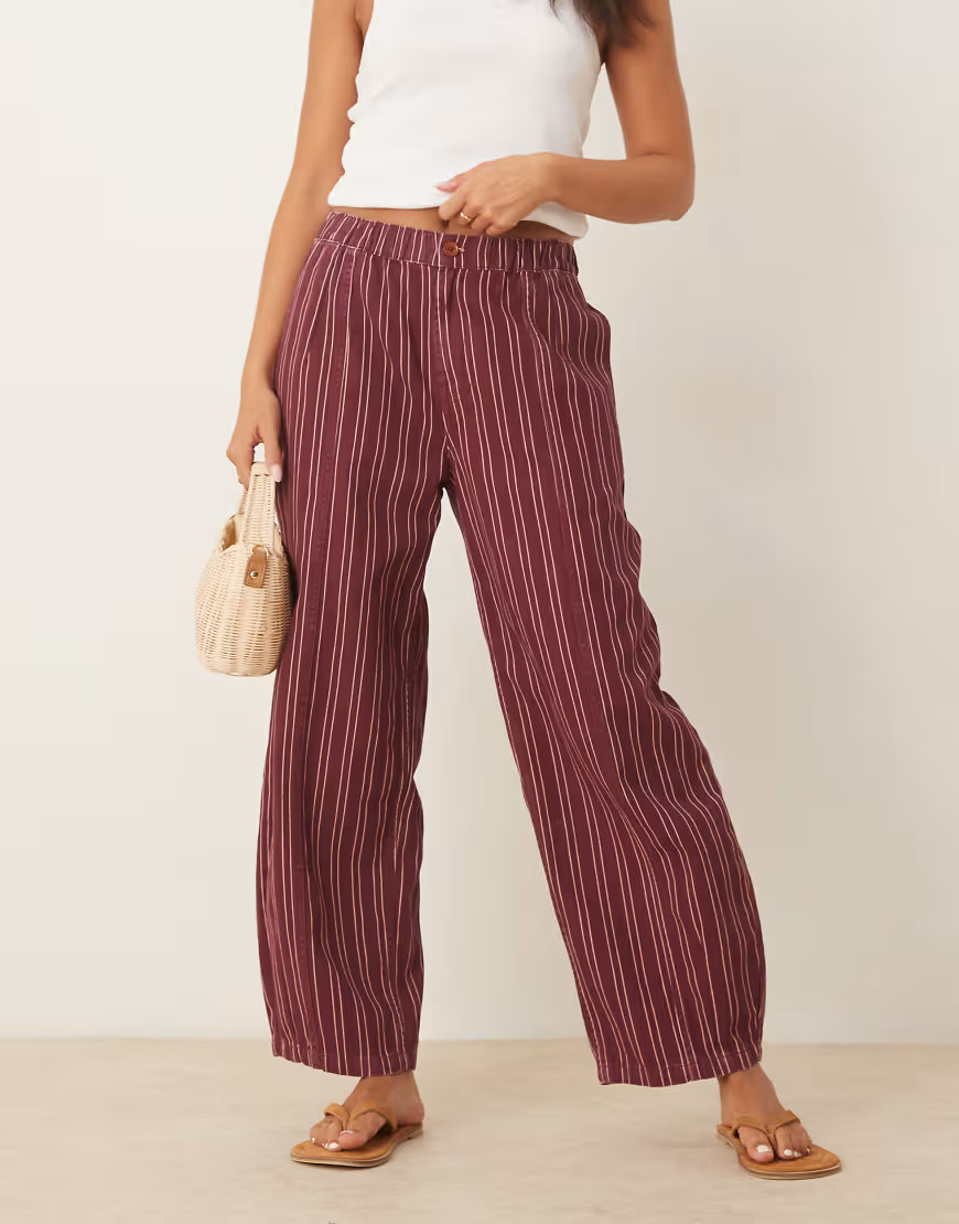 ASOS DESIGN laundered pull on barrel trousers in burgundy stripe | ASOS (Global)