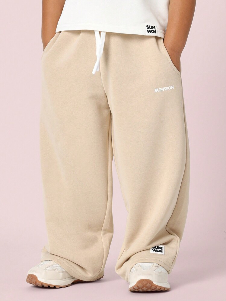 SUMWON Jugendliche Weitbeinige Athletische Jogginghose, Relaxed Fit, Elastischer Bund mit Kordel,... | SHEIN