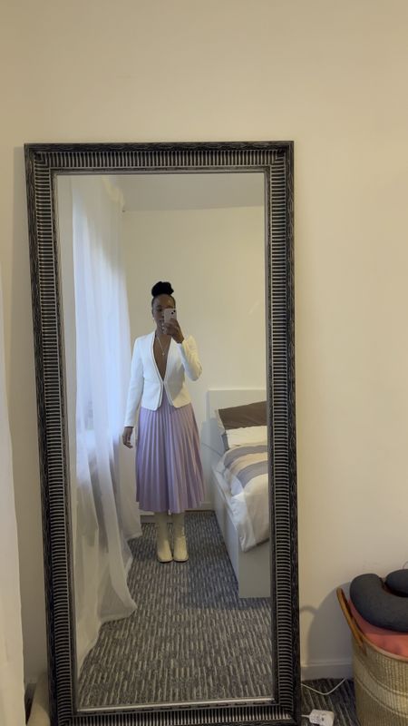 I love this white blazer and purple pleated skirt combo. The boots had to much with the coat to give it a complete look. I’d wear this to an office or to brunch. #LTKGIFT

#LTKeurope #LTKworkwear #LTKstyletip