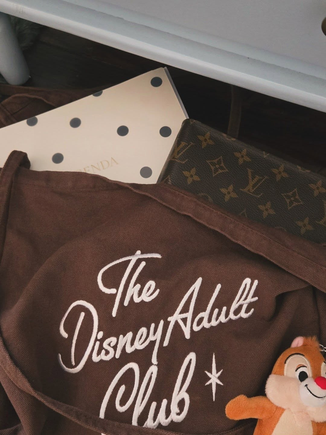 The Disney tote you didn't know you needed. I use this bag every single day. It has become a fun way to style my work look and celebrate this anthem. Lightweight, super roomy, and just the right ratio for shoulder to body. 🐿️🤎

#DisneyAdultsDoExist #DisneyFashionista #DisneyOotd #DisneyBoundingStyle #DisneyMerchandise

#LTKWorkwear #LTKdayinmylife #LTKTravel