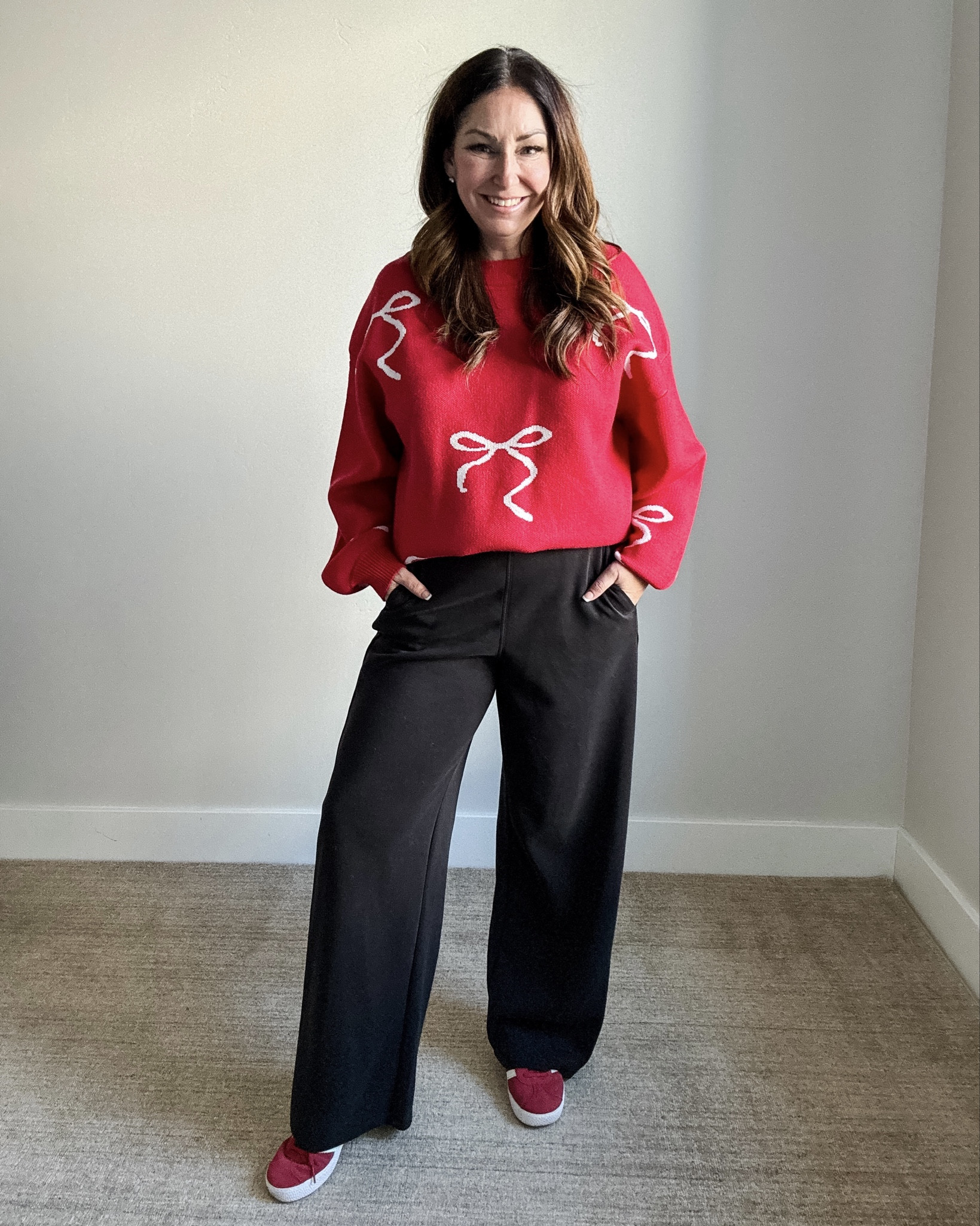 Holiday Bow Sweater Casual Outfit | Wearing sweater, L tucked up runs longer and Pants run small, XL 

 

#LTKHoliday #LTKMidsize #LTKFindsUnder50