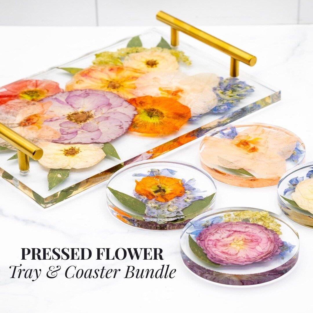 Turn your wedding flowers into heirloom décor with this elegant resin tray and coaster preservation set by WCFlowerPreservation. Your bridal bouquet is expertly preserved and transformed into a timeless serving and display piece, perfect for charcuterie nights, vanity styling, or simply reliving your special day. With gold handles and beautifully coordinated details, this set blends meaningful memories with functional, elevated home décor.
#LTKweddings #LTKhome #weddingkeepsake #flowerpreservation #resindecor #bridalinspo #sentimentalhome #customdecor #heirloomdesign #etsyfinds

#LTKSeasonal #LTKWedding #LTKHome