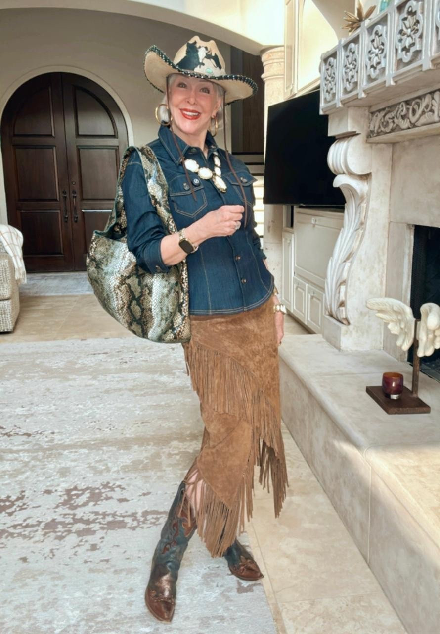 Cinq á Sept denim shirt
Suede fringe skirt by @scully
Python print leather hobo bag
Cowboy boots 

#LTKSeasonal #LTKItBag #LTKOver40