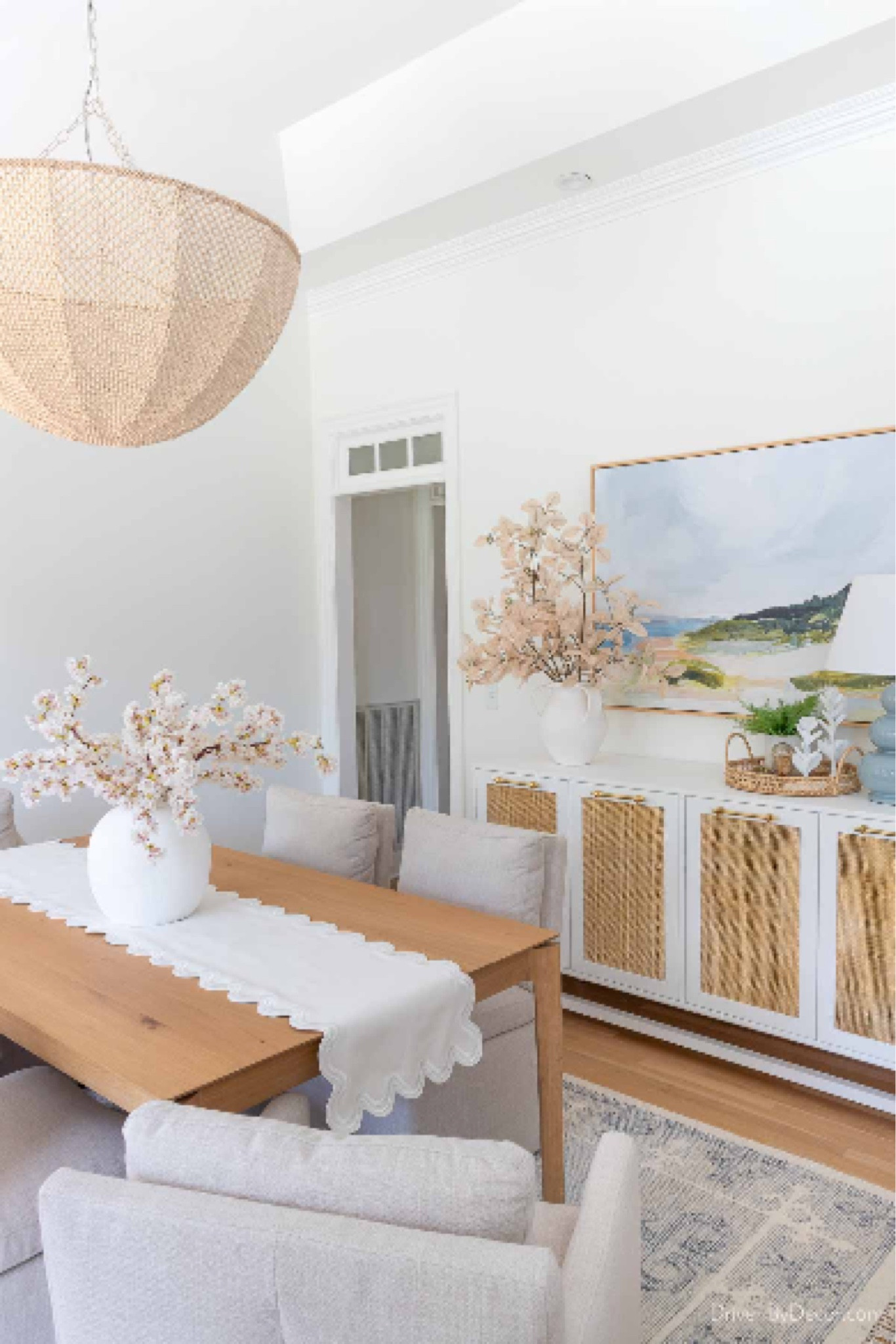 Sharing all of the sources for our dining room including our console with cane doors, art, lamp, chandelier, rug, upholstered chairs, and more!

#LTKFindsUnder50 #LTKFindsUnder100 #LTKHome