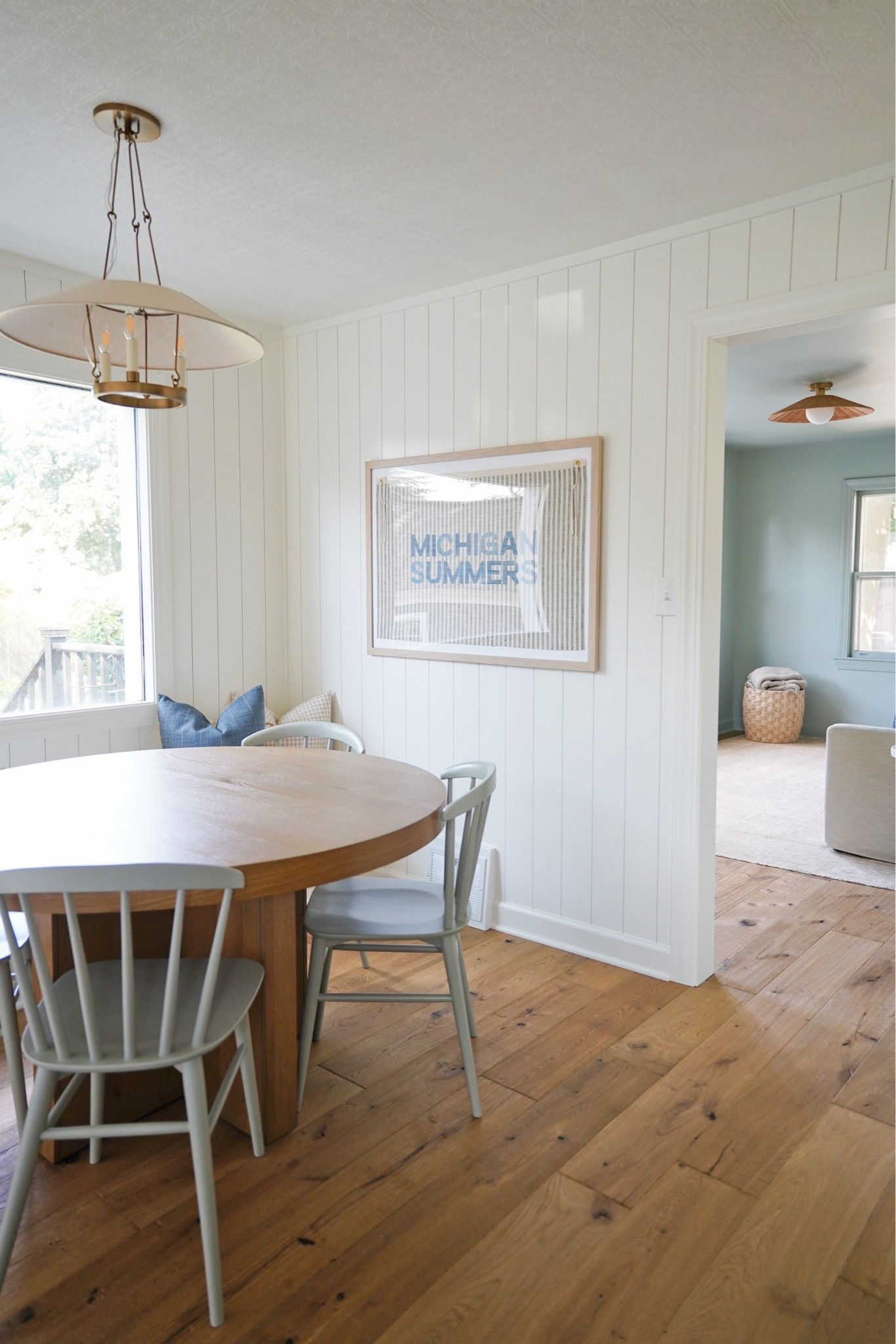 Cottage dining room! Art is custom by Bird & Belle (can’t link here). Floor is Anderson Tuftex Artisan Oak Linseed. Dining paint is BM Simply White. Family room paint is SW Oyster Bay. Kitchen rug is vintage from Etsy. Woven shades are linked - code HANNAHJANSMA for 22% off - we have color Beige, outside mount, privacy liner, cordless.

#LTKHome