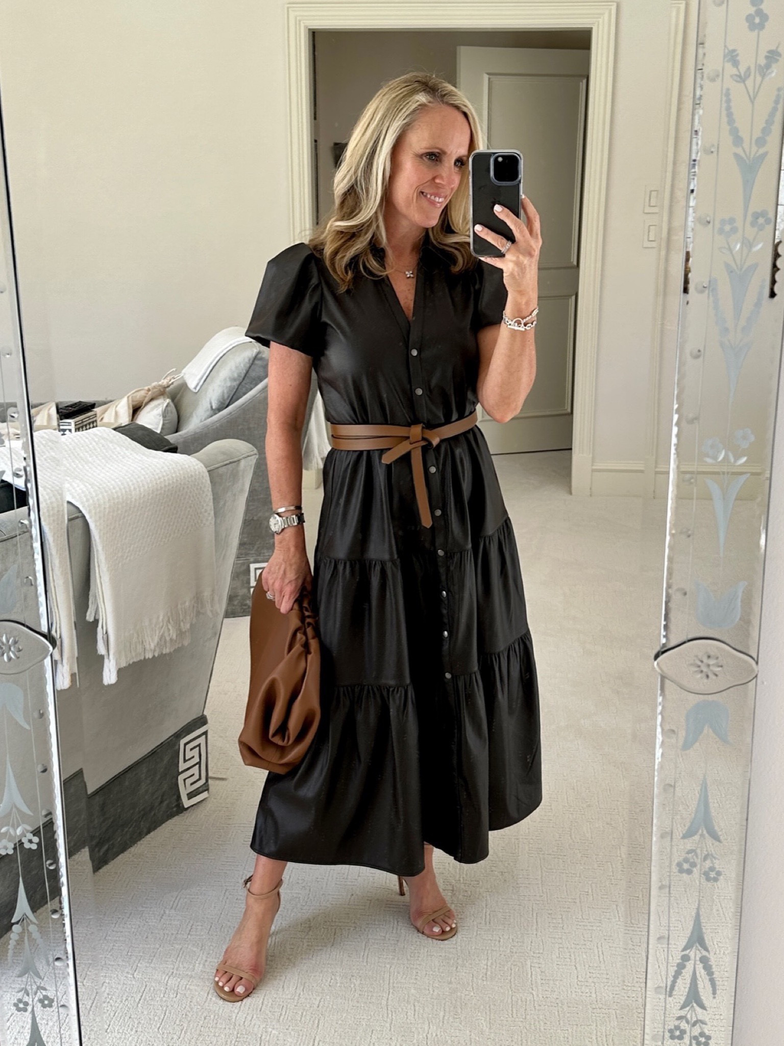 One of my very favorite dresses!   The rich color, the soft leather and the flattering fit is perfect for Fall.   

Brochu Walker faux chocolate brown leather 
Best faux leather dress 
Fits TTS 
Fall transition 
Nude heel sandals Stuart Weitzman

#LTKSeasonal #LTKU #LTKstyletip