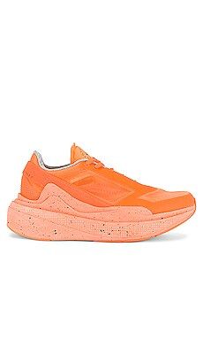 adidas by Stella McCartney Earthlight Sneaker in App Signal Orange & Core Black from Revolve.com | Revolve Clothing (Global)