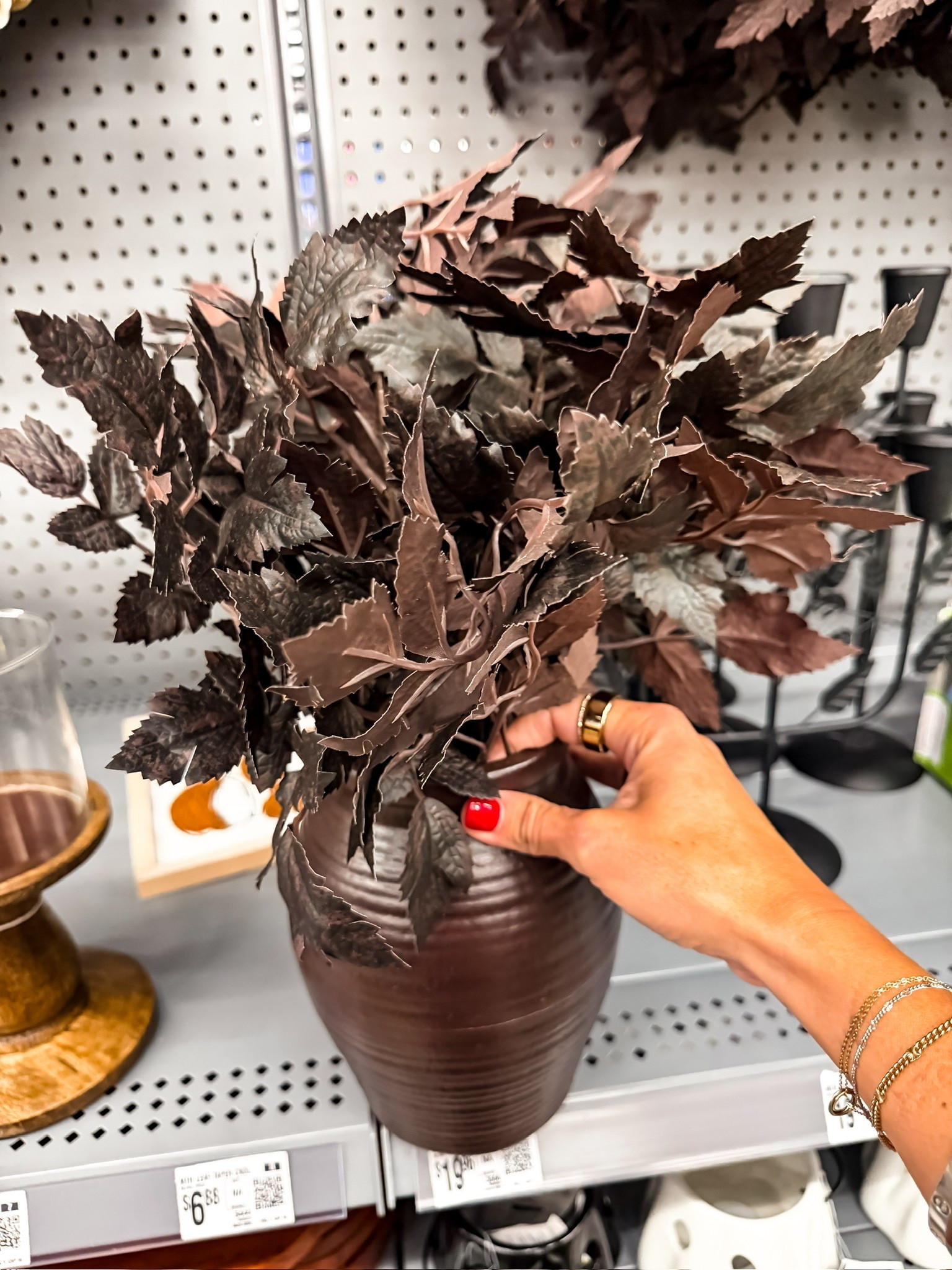 These deep brown faux fall stems are such an easy way to bring warmer color into the house without going straight to orange. I love them grouped together in a simple vase for a full, moody arrangement that can stay out all season.

fall stems, faux fall stems, artificial branches, fall floral arrangement, brown home decor, autumn decor, fall centerpiece, vase filler, seasonal home decor, neutral fall decor, TheMomInStyle

#LTKSeasonal #LTKHome #LTKOver40