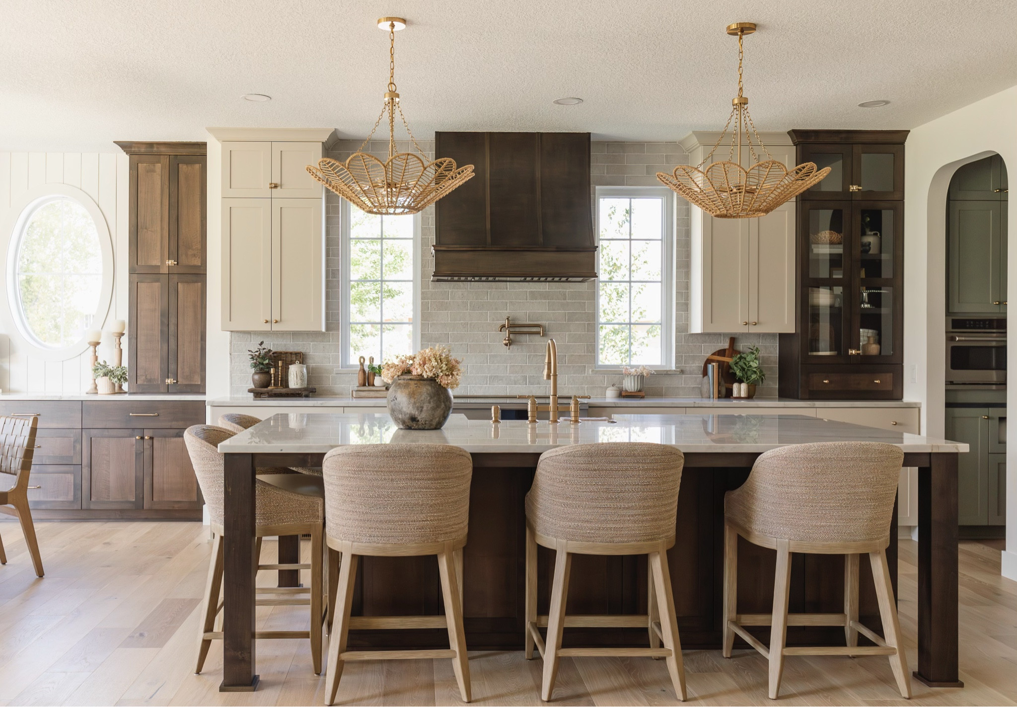 Kitchen design ideas with light beige cabinets and dark stained accents. Lots of texture with the woven pendants and sea grass stools.

#LTKSaleAlert #LTKFamily #LTKHome
