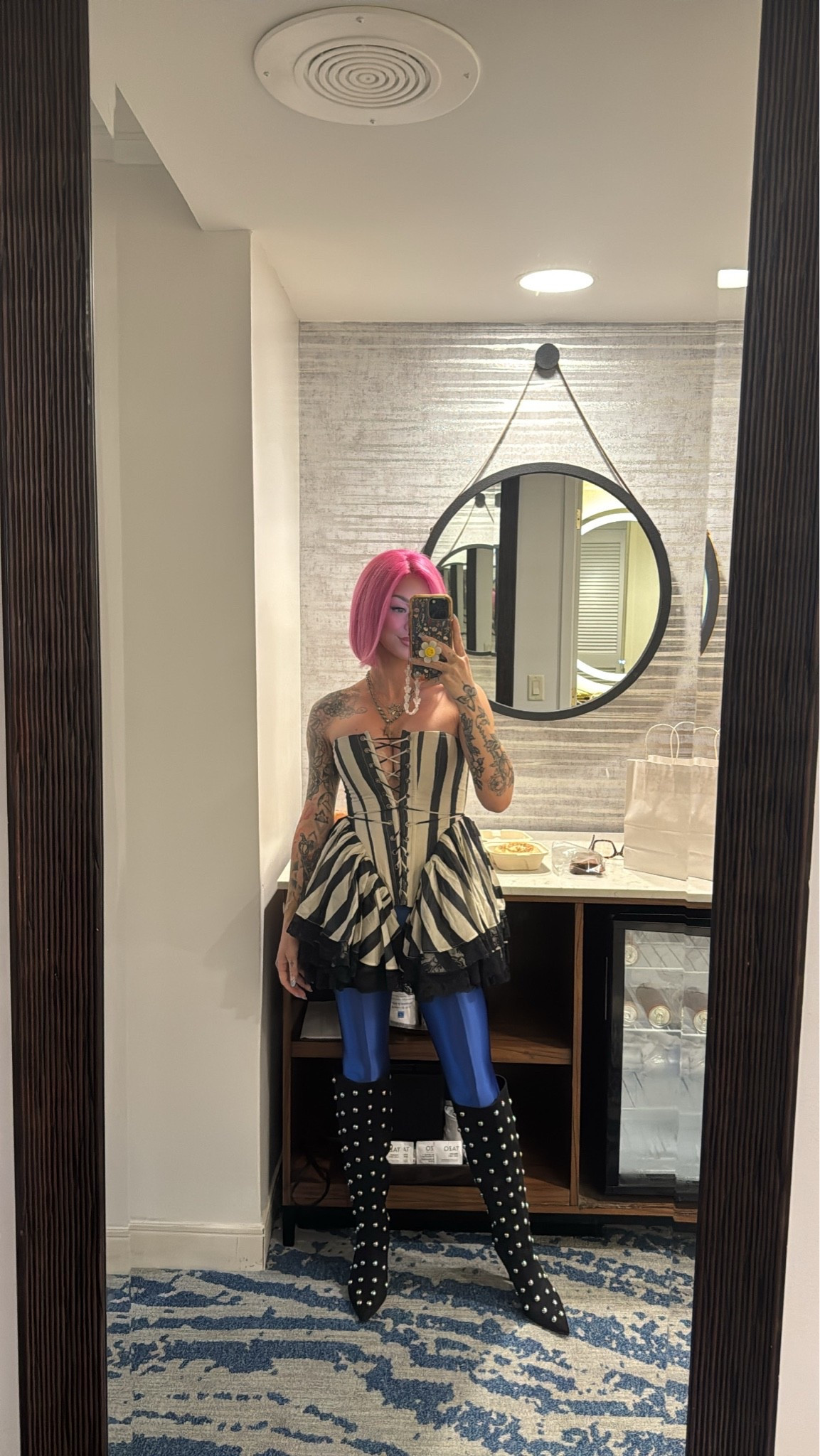 can’t link bc these brands aren’t on LTK😭
corset; selkie 
boots: Steve Madden
Leggings: so old i literally can’t remember