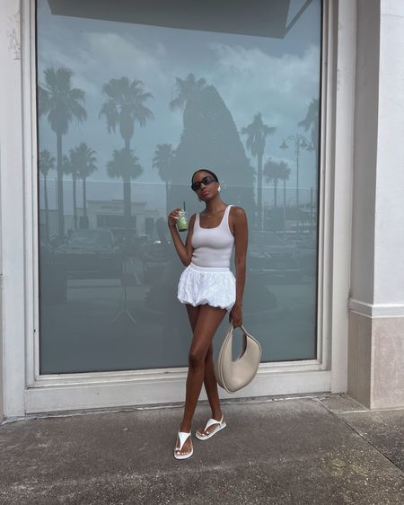 It officially summer! Pretty obsessed with the balloon shorts. Sandals are Zara but I linked similar styles with silver hardware.  

#LTKStyleTip #LTKFindsUnder100 #LTKItBag