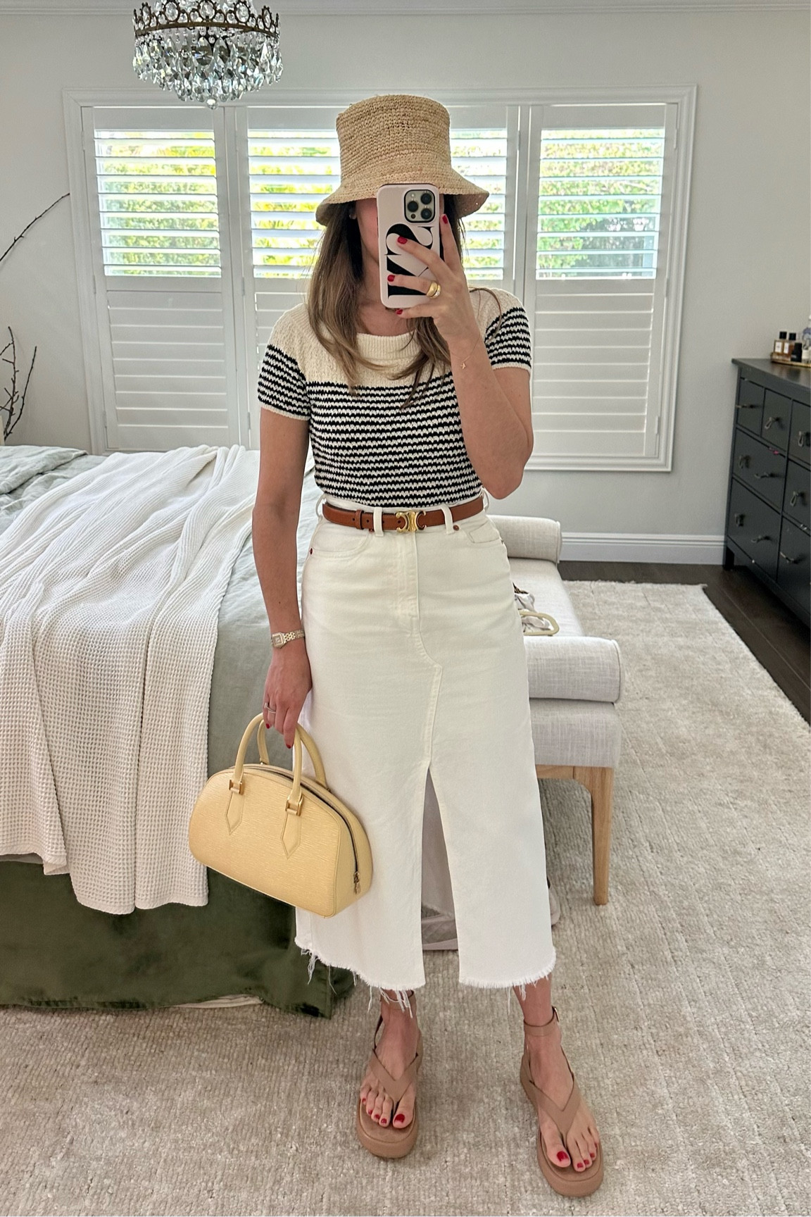 Spring outfit inspo: Nautical stripes + white denim. Styled with these new platform sandals that will be a spring break & summer staple (and under $100!). 

stripes, knit top, denim skirt, raffia bucket hat

#LTKSeasonal #LTKfindsunder100 #LTKshoecrush