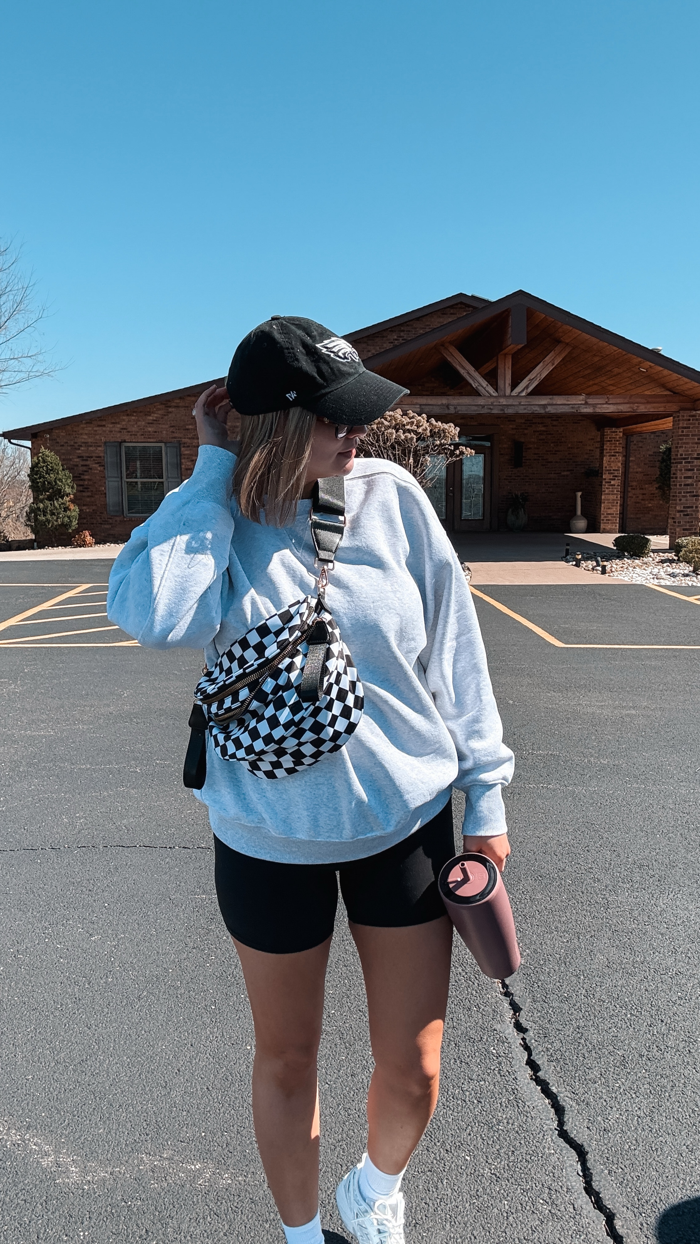Loving this spring weather 😍😍

Sizing:
Sweatshirt-L
Biker Shorts-10
Sneakers-TTS

Bag is from TikTok shop & linked on my showcase! 

#LTKWatchNow #LTKStyleTip #LTKMidsize