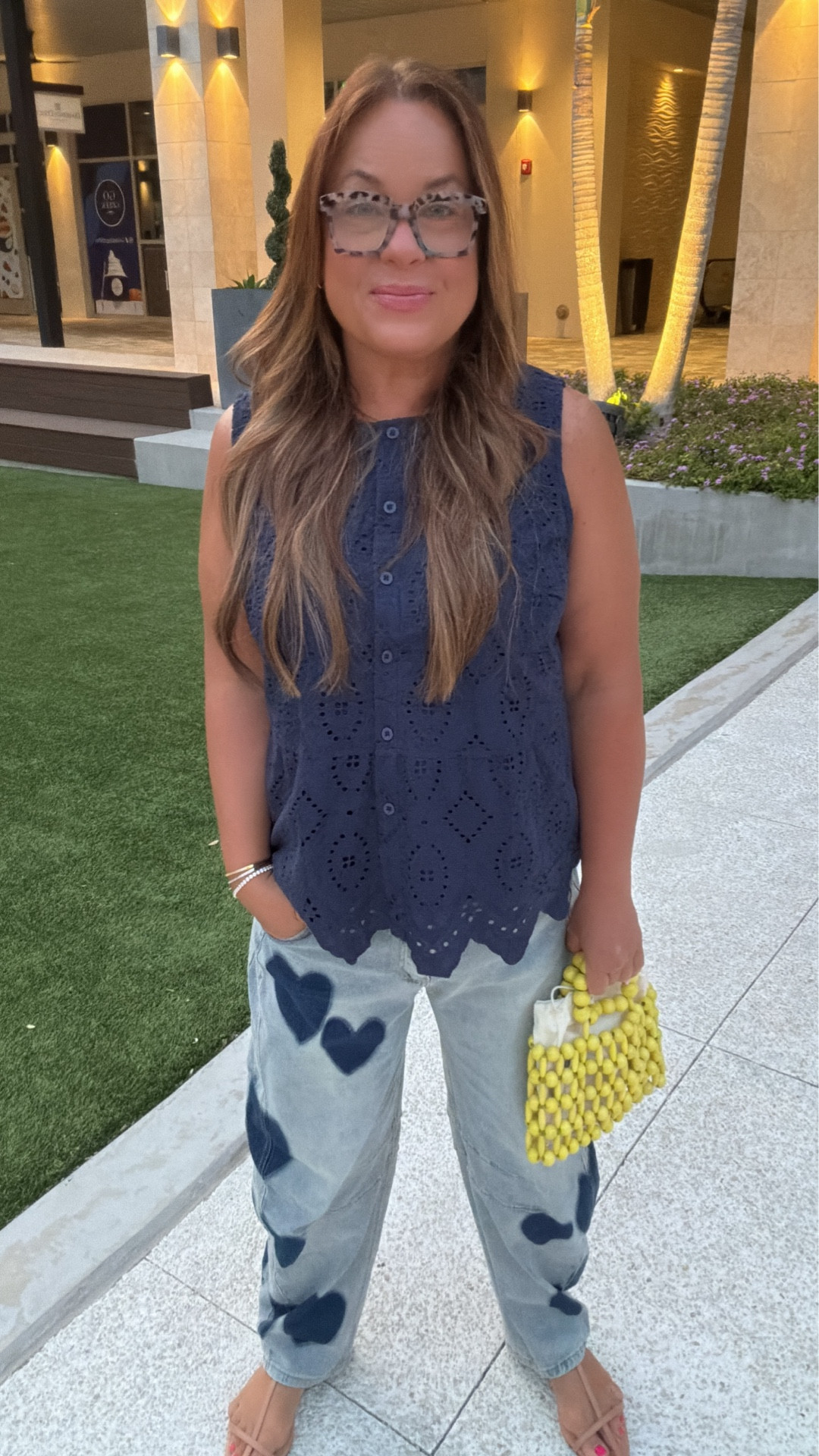 Dressing cute and fun… but not like my 20-year-old daughter 🤍

These barrel jeans are the perfect Free People lookalike with just enough stretch (size down if between). Paired with a classic eyelet tank that gives great length and coverage, my go-to pointy flats, everyday Amazon gold huggies, and this fun beaded Anthro bag for a pop of summer color 💛

#LTKOver40 #LTKMidsize #LTKgrwm