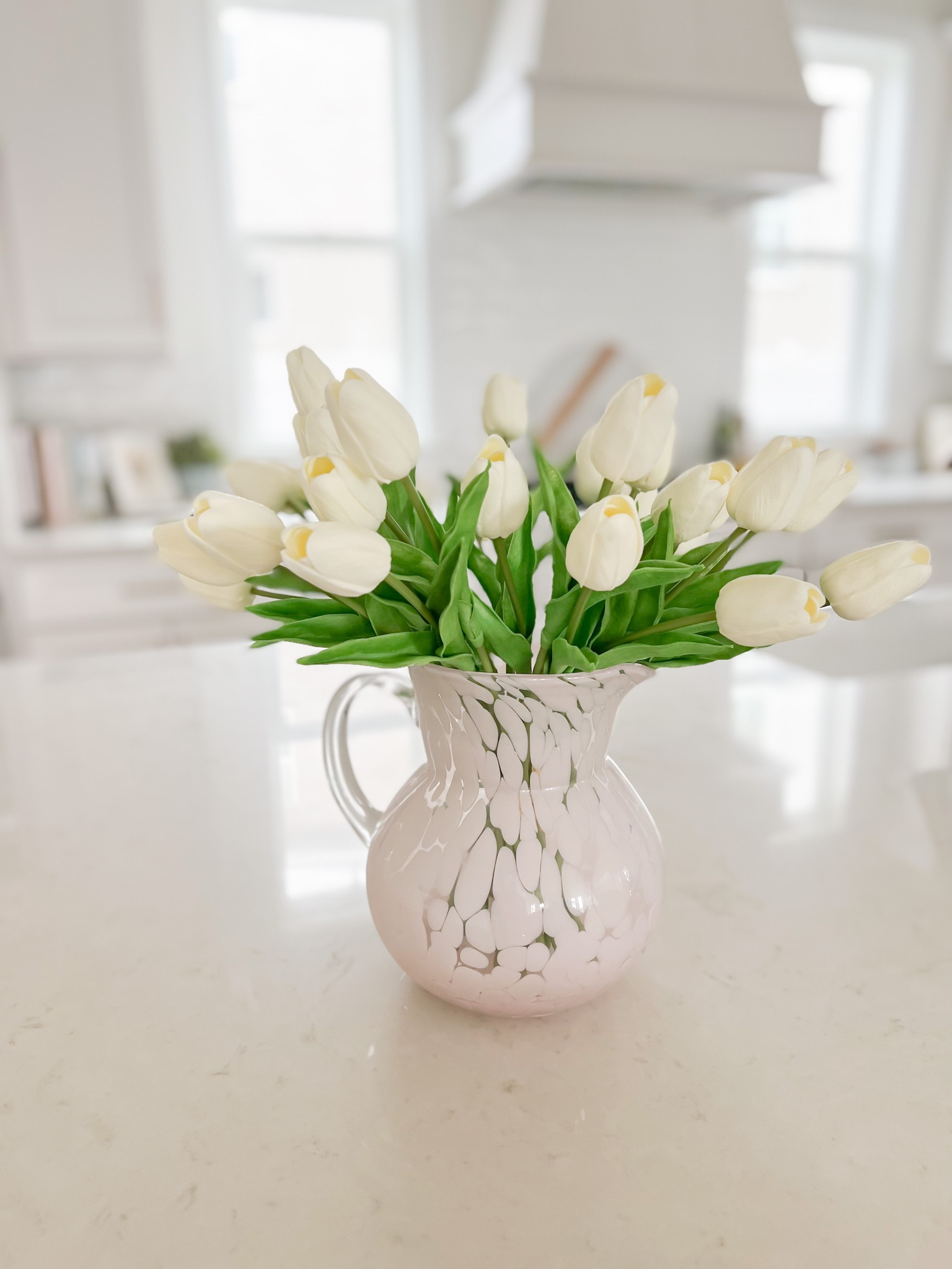 The most beautiful & affordable faux tulips that will last for years to come! 

Pitcher is from hobby lobby in their Easter section! 

#LTKunder50 #LTKSeasonal #LTKhome