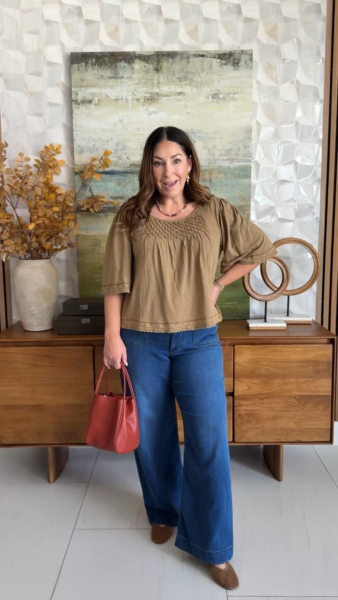The smocked neckline and flutter sleeves on this top are everything. 🍂 Comfy cotton, and a little pop of color in the bag makes it feel extra.
📏Wearing Top tts, L | Jeans size down, 30

#LTKSeasonal #LTKOver40 #LTKMidsize