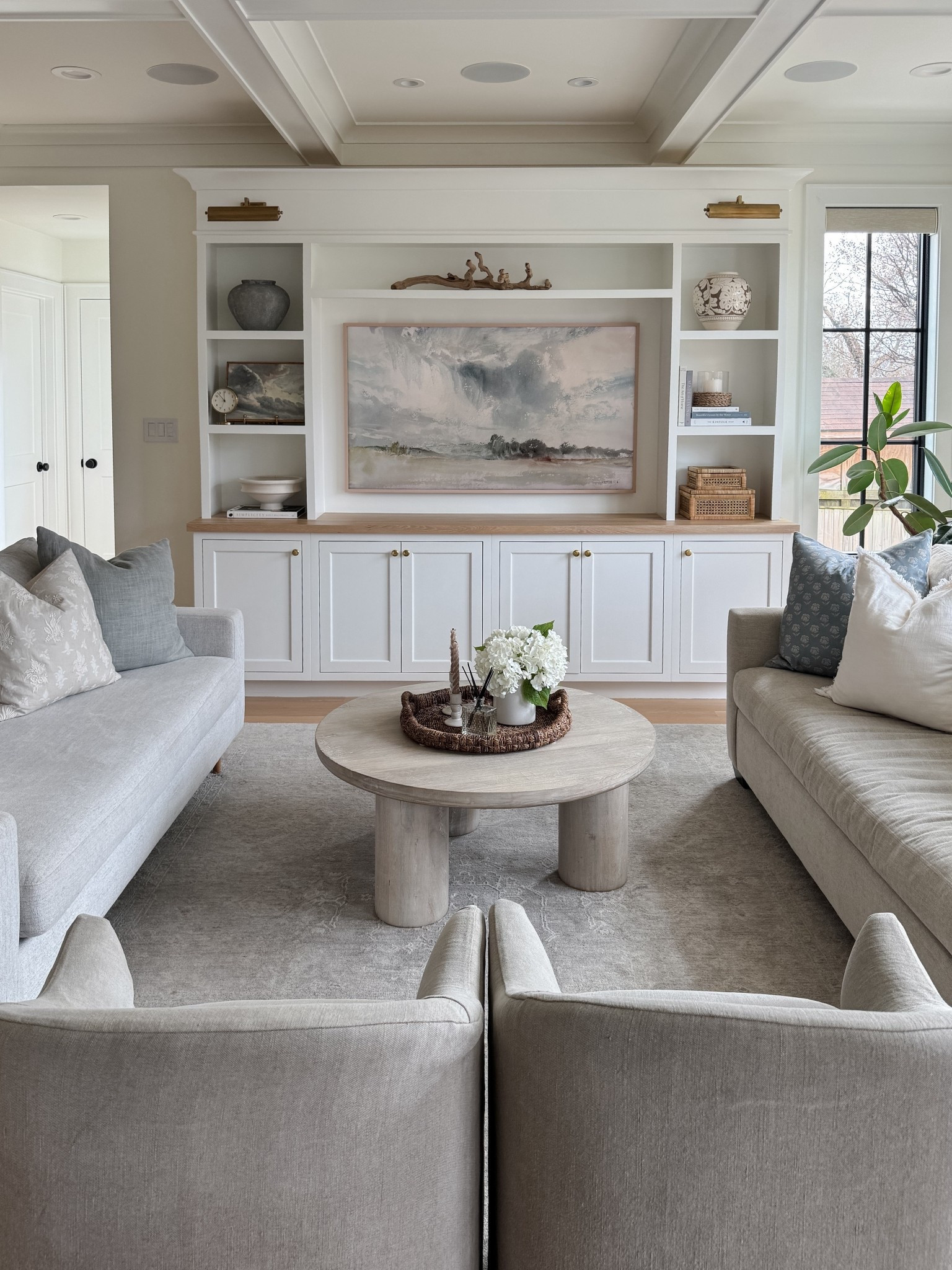 If you love a modern coastal look but want it to feel lasting, start with layered neutrals.

Then add in subtle soft blues and woven accents for texture and depth. The mix keeps the living room feeling airy and relaxed while still refined and pulled together.

#LTKsalealert #LTKhome #LTKstyletip